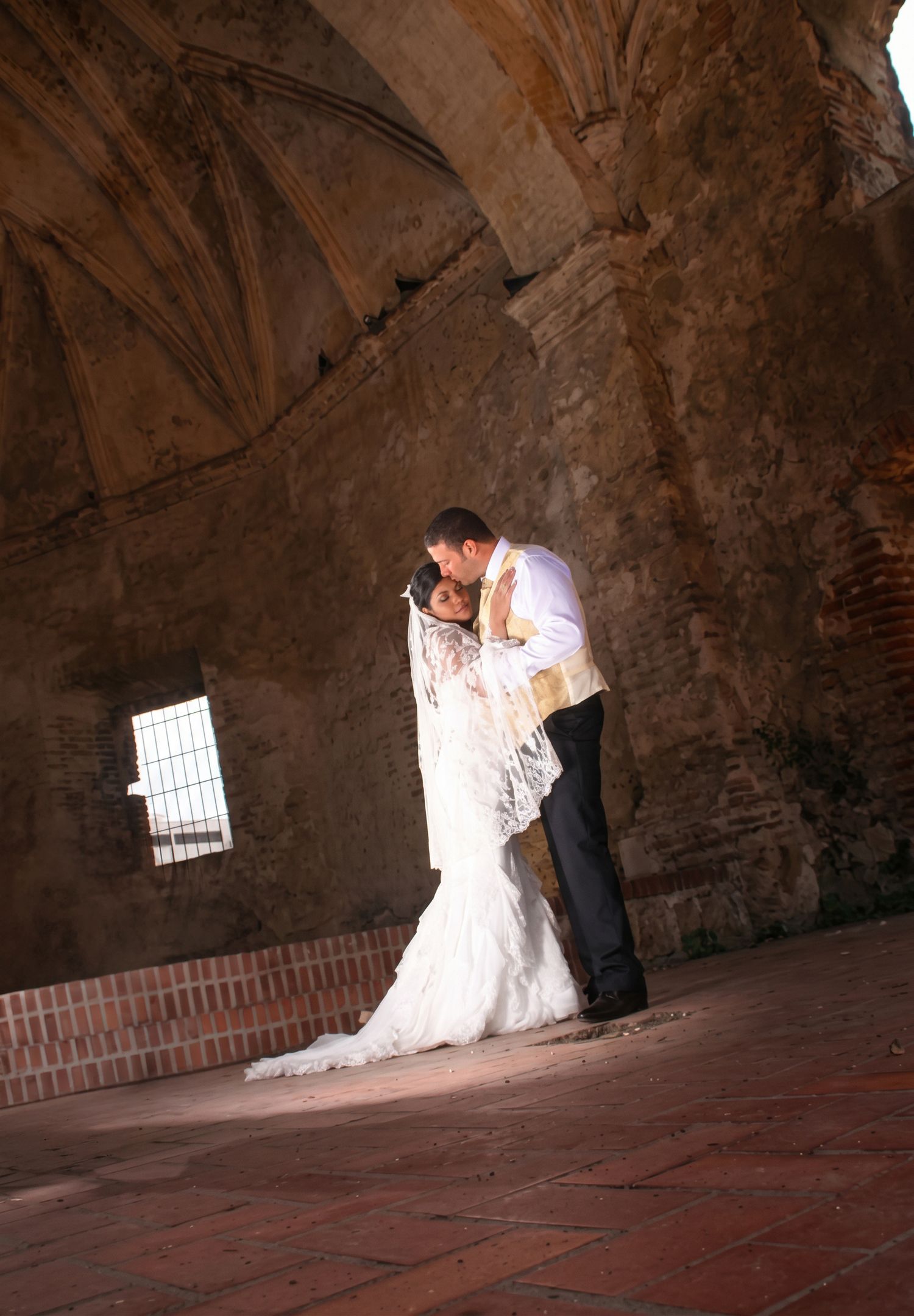 Bride and groom walking across scenic wooden bridge - Philadelphia wedding photography