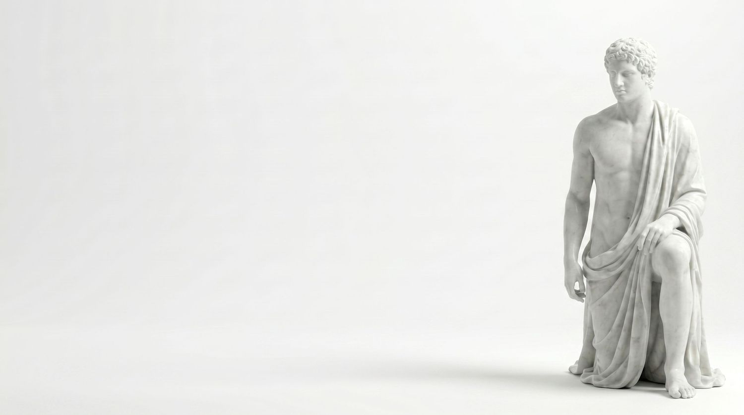 White marble classical Greek statue of a seated male figure draped in robes on a white background.
