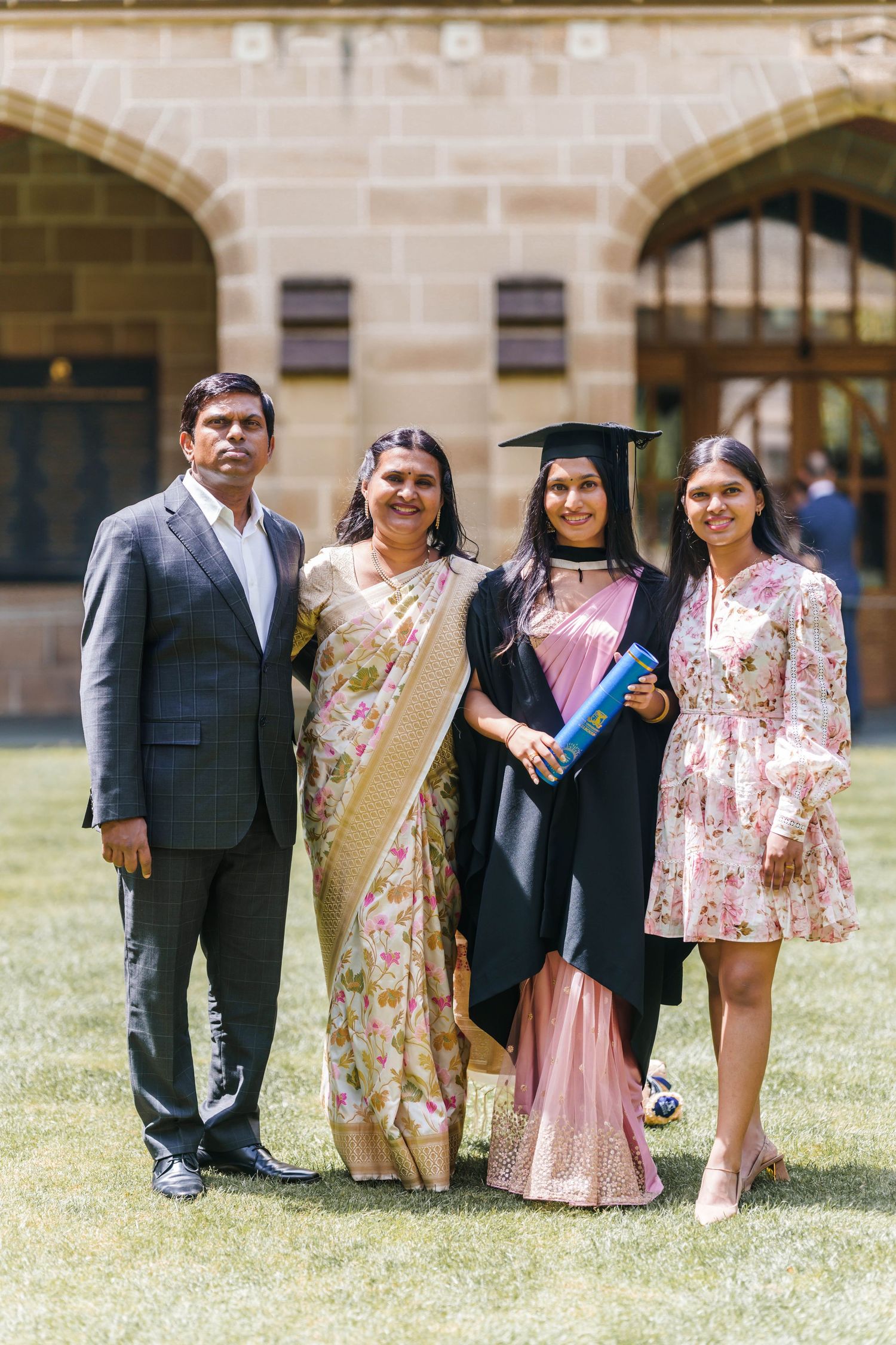 A series of graduation photos showing groups of family members posing together outdoors on a sunny day.
