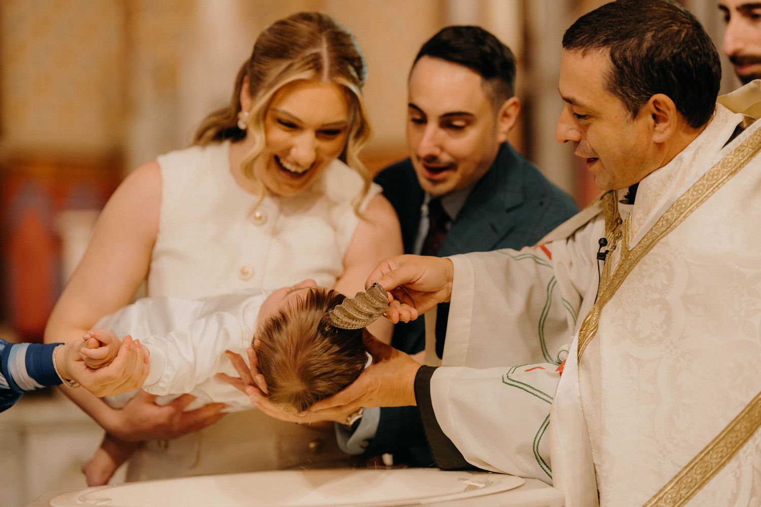 A joyful wedding couple shares intimate laughter and tender moments in a series of candid photographs.