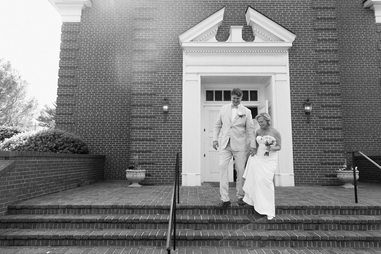 A series of black and white photographs showing vintage wedding scenes outside a brick church building.