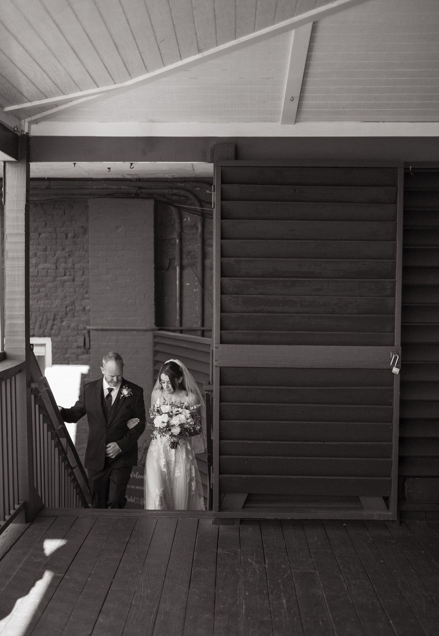 Black and white images of a covered porch entrance showing dramatic shadows and architectural lines.