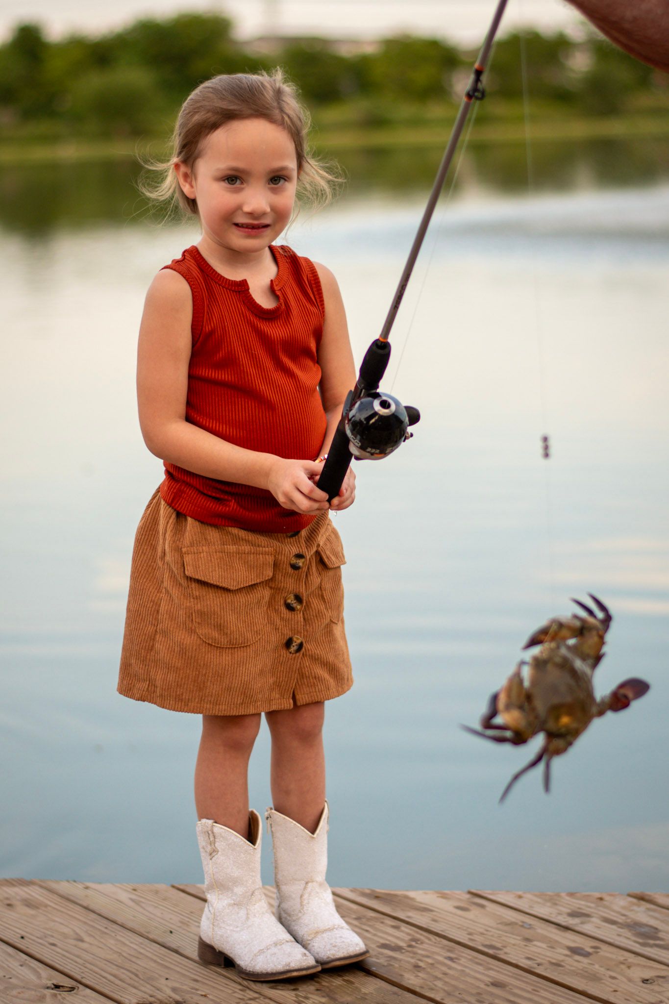 Catching crabs fishing at sunset with family