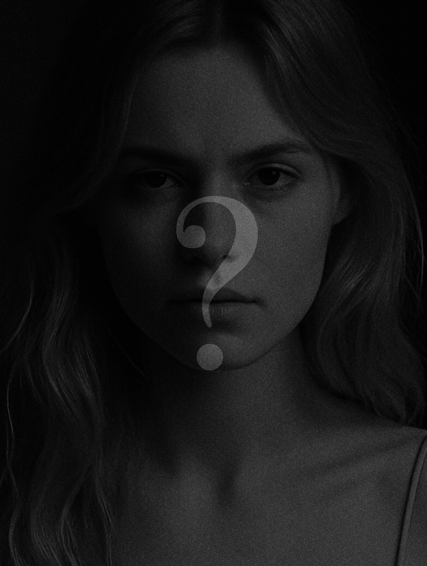 Atmospheric portrait with mysterious question mark symbol placed over facial features.