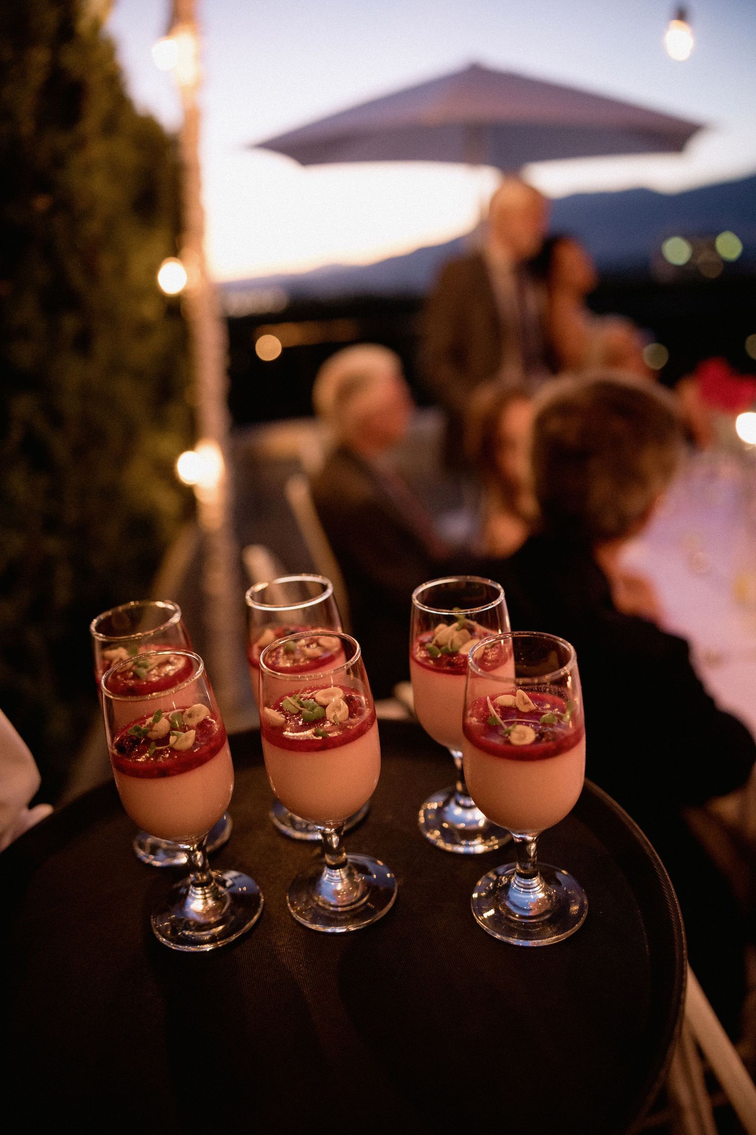 Chocolate mousse desserts served in elegant stemmed glasses with garnish at an evening event in Vancouver