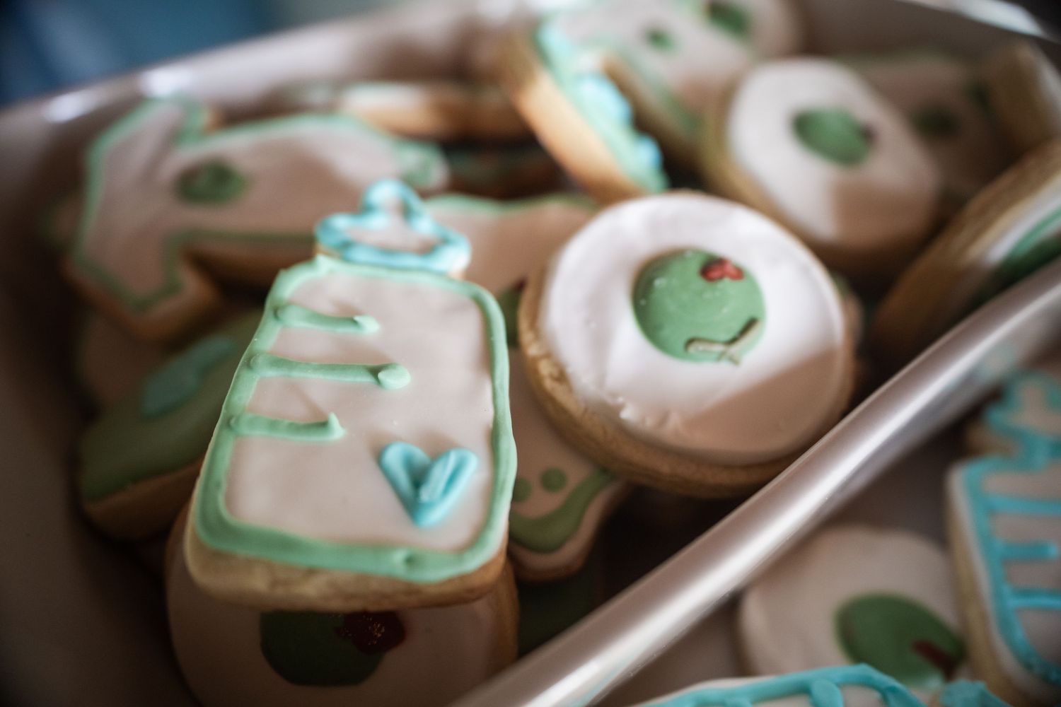 Close-up of custom baby shower cookies styled for a South Florida celebration.