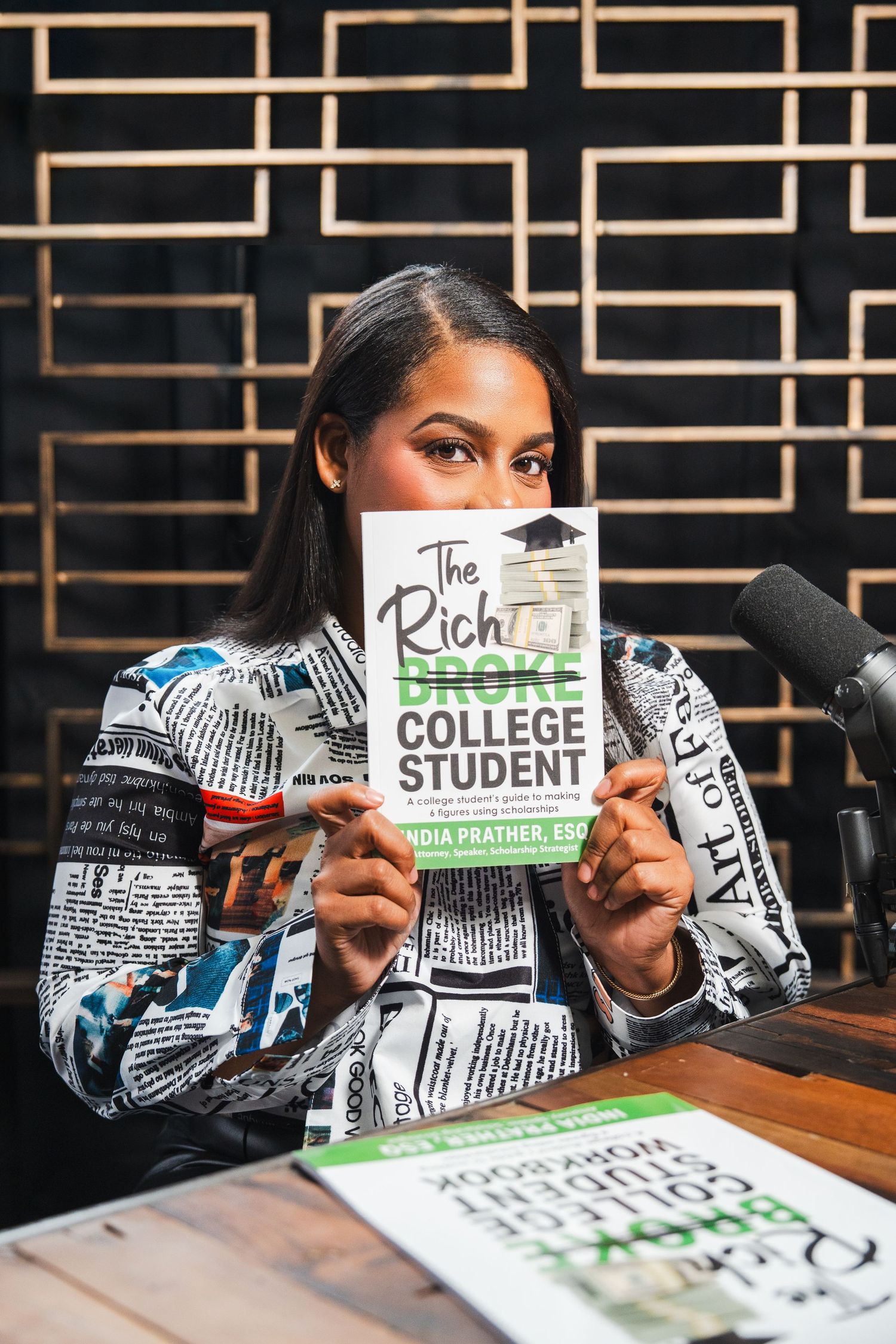 Personal branding photo of a scholarship coach holding a book during an entrepreneur branding session in South Florida.
