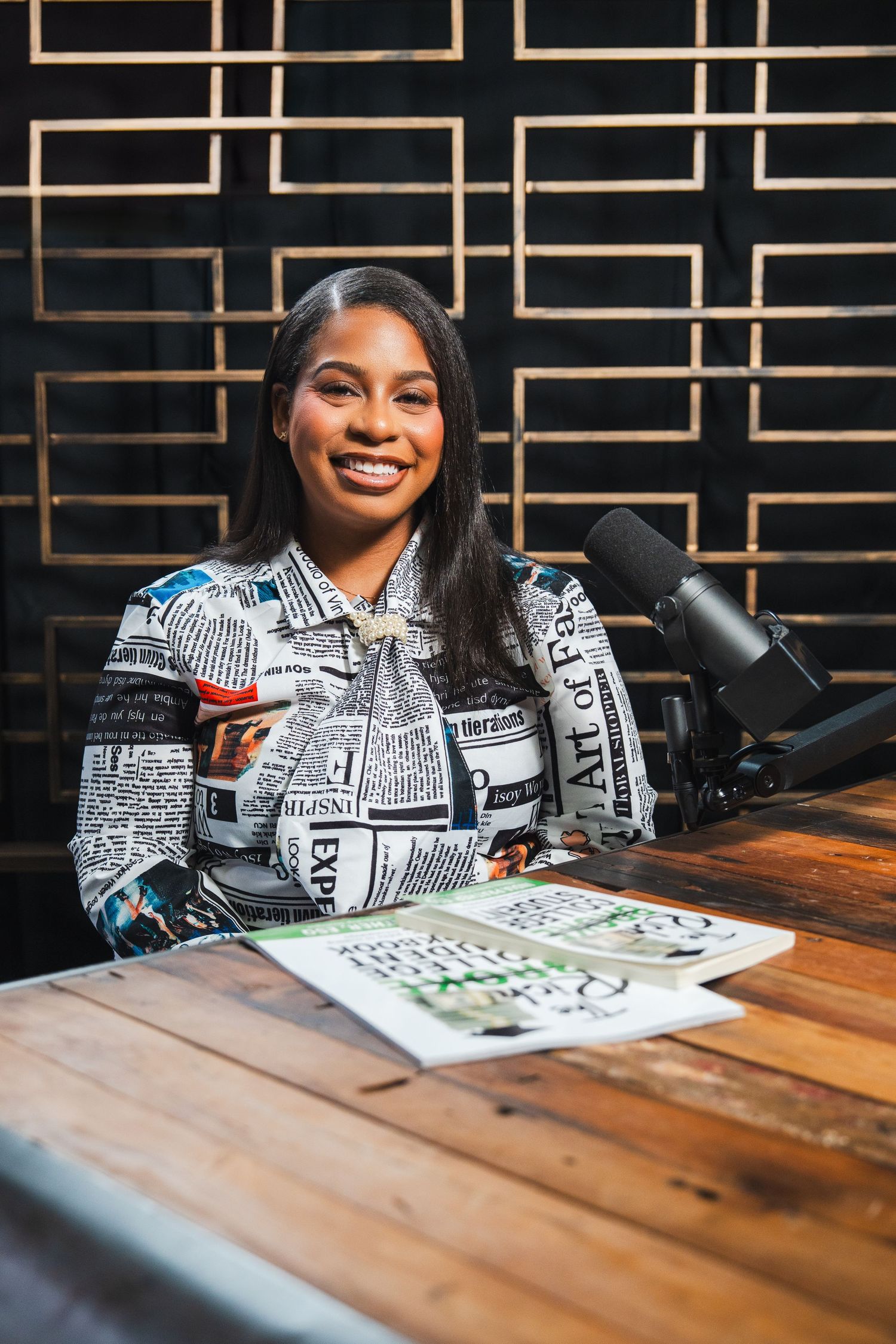Scholarship coach branding portrait seated at a table, professional and approachable personal brand photography.