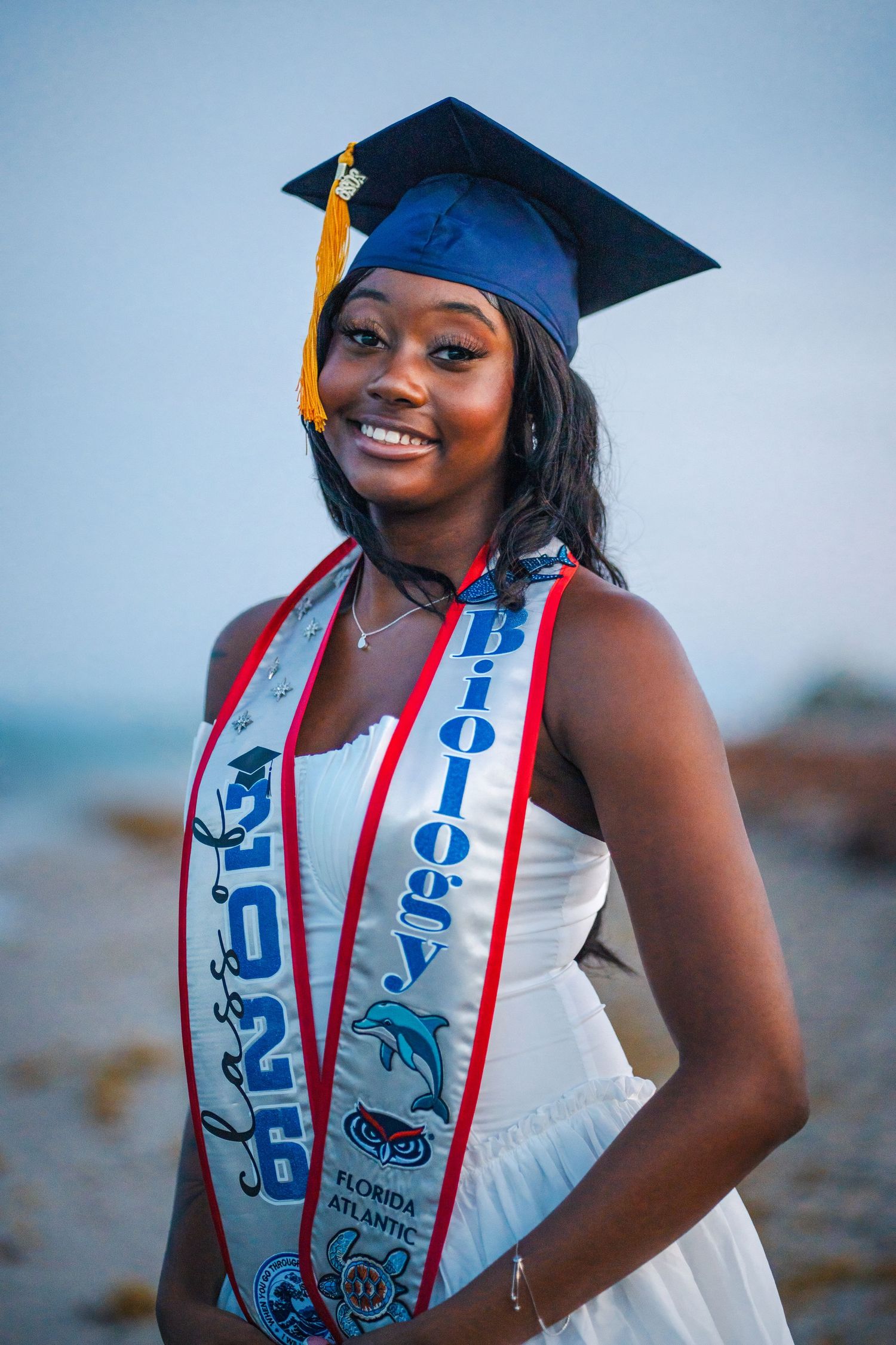 Close-up FAU graduation portrait from a guided photography experience highlighting confidence and achievement in Boca Raton