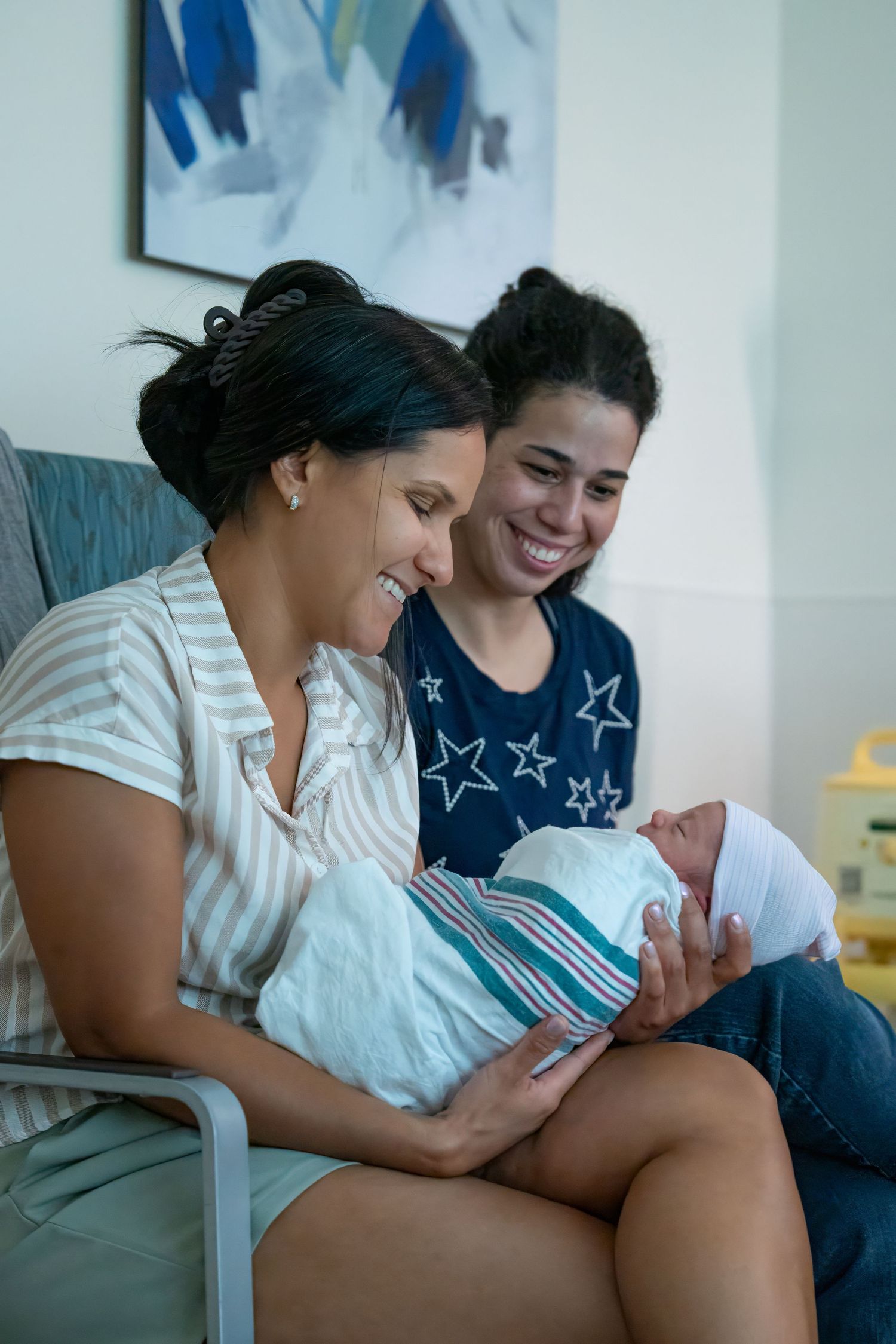 Fort Lauderdale newborn photography of parents admiring baby at home

Pembroke Pines Photographer