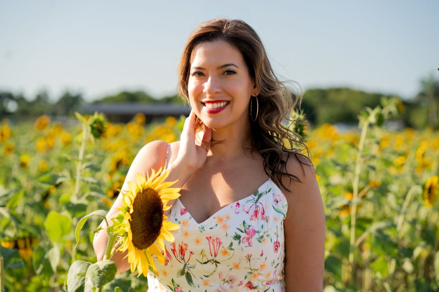 Profile shot in sunflowers from a South Florida birthday photo session.