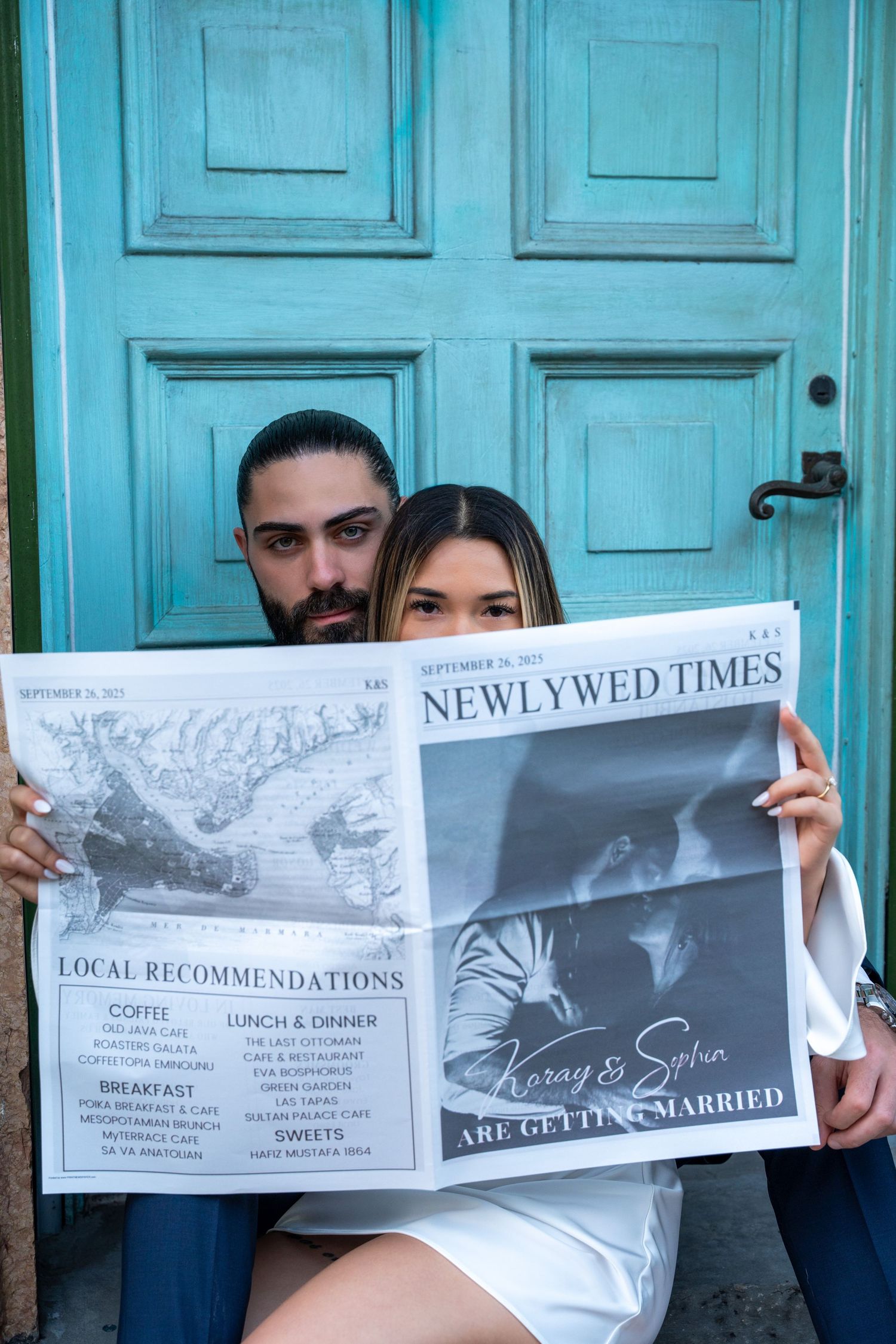Couple reading newspaper together during lifestyle portrait session in South Florida engagement photoshoot in worth ave