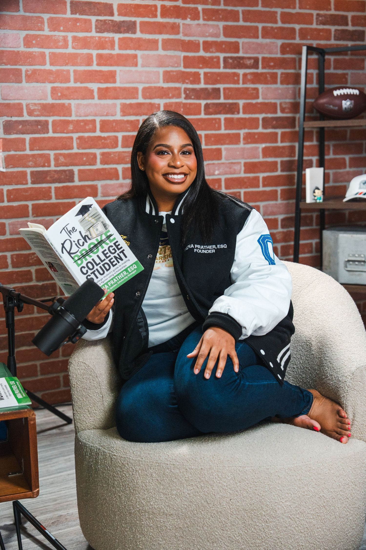 Scholarship coach branding portrait seated casually during a personal brand photography session in South Florida.