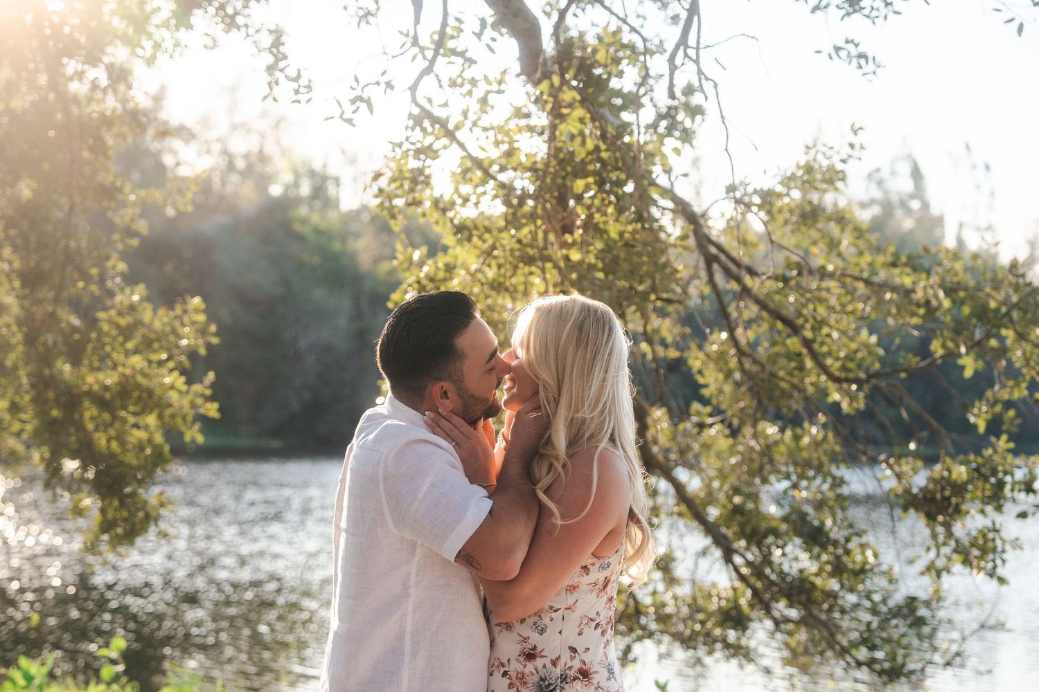 Golden hour engagement session at Tree Tops Park captured through a guided photography experience in Davie South Florida with couple by