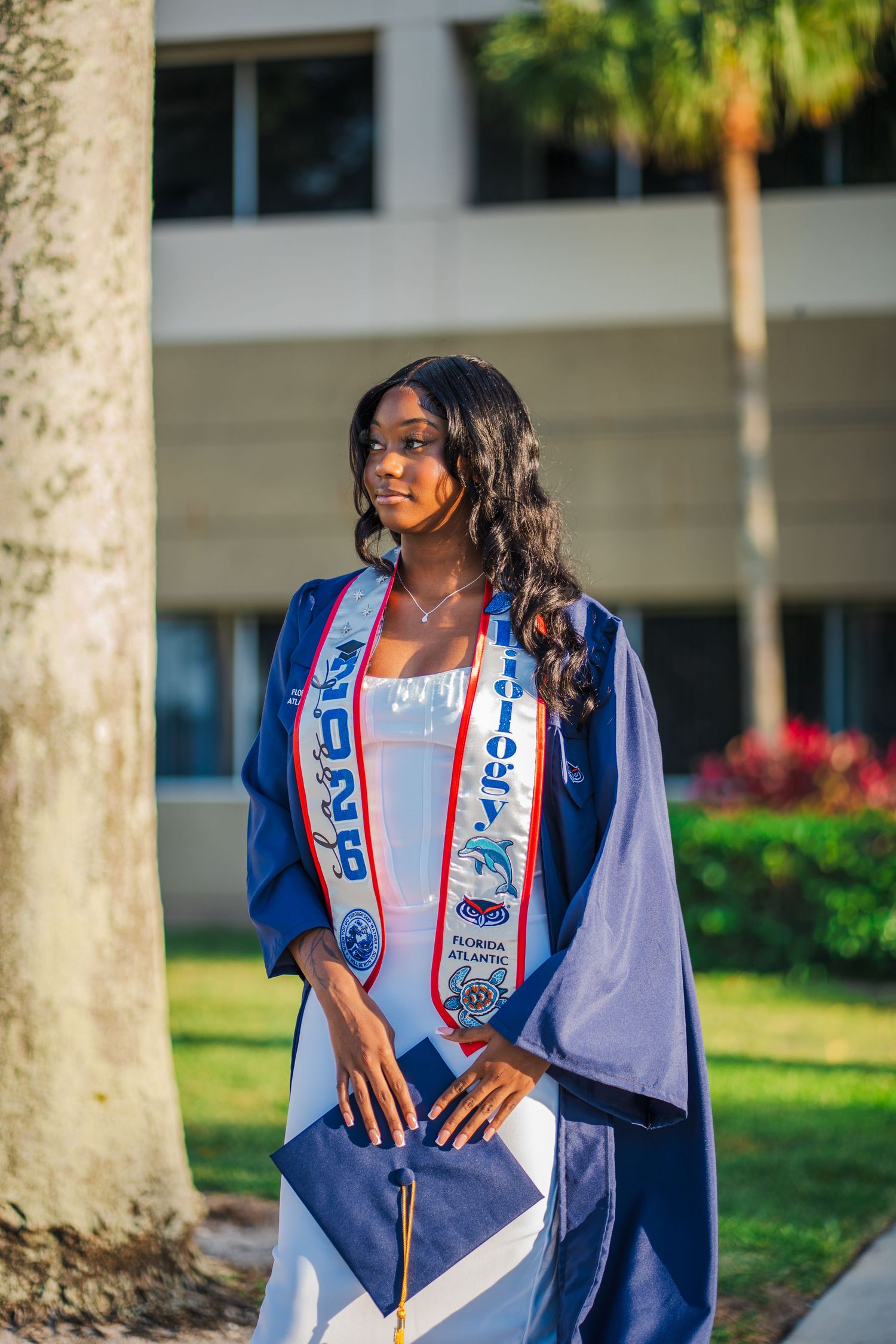Natural and confident FAU graduation portrait from a guided photography experience on Boca Raton campus