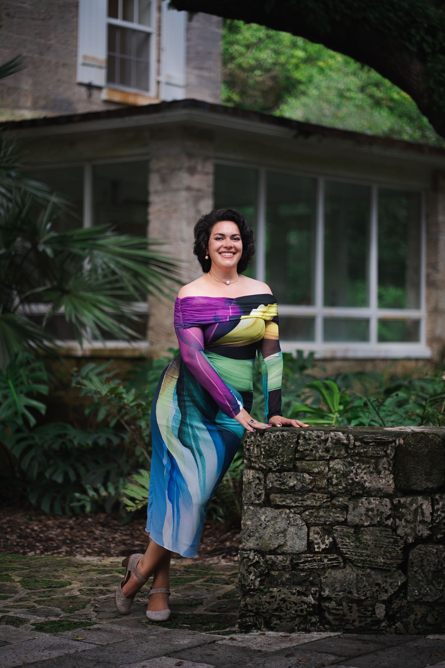 Personal branding portrait of an Author  posing outdoors at Fairchild Botanical Garden in Miami.