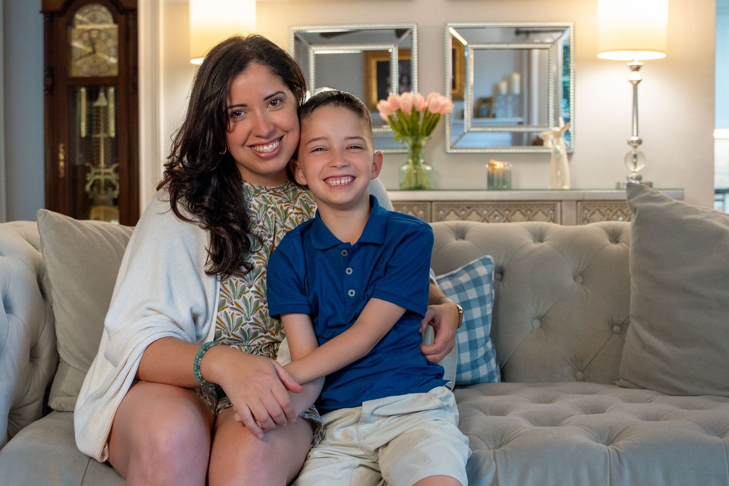 Mother and son portrait in West Palm Beach, FL – warm and loving indoor photoshoot capturing a special bond.