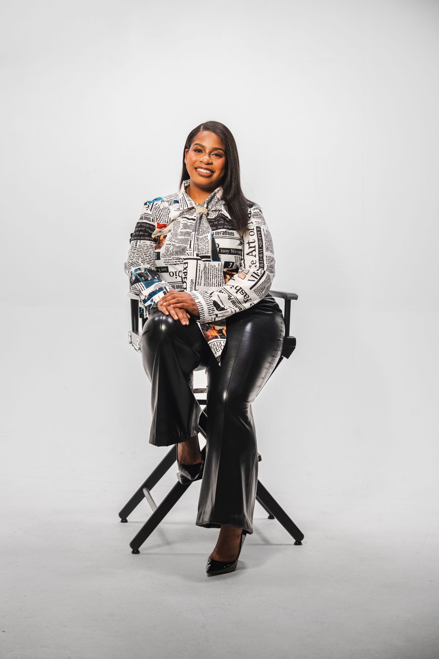 Entrepreneur seated on stool during studio branding session in Miami