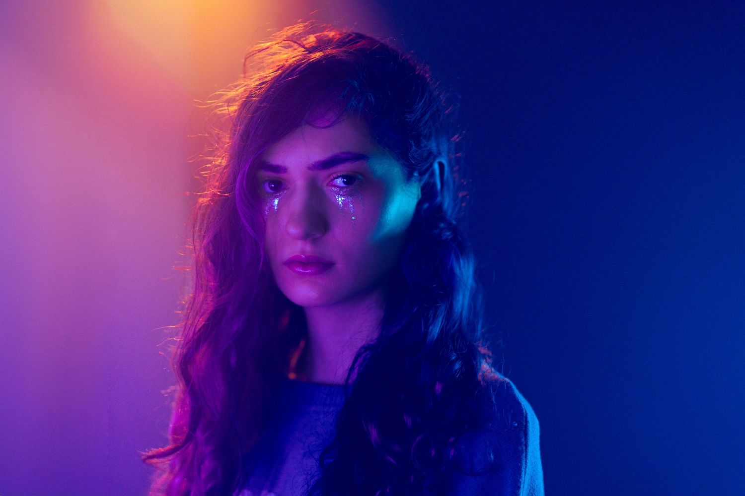 Modern cinematic photography in West Palm Beach, FL – unique blend of neon colors creating an artistic and emotional mood.