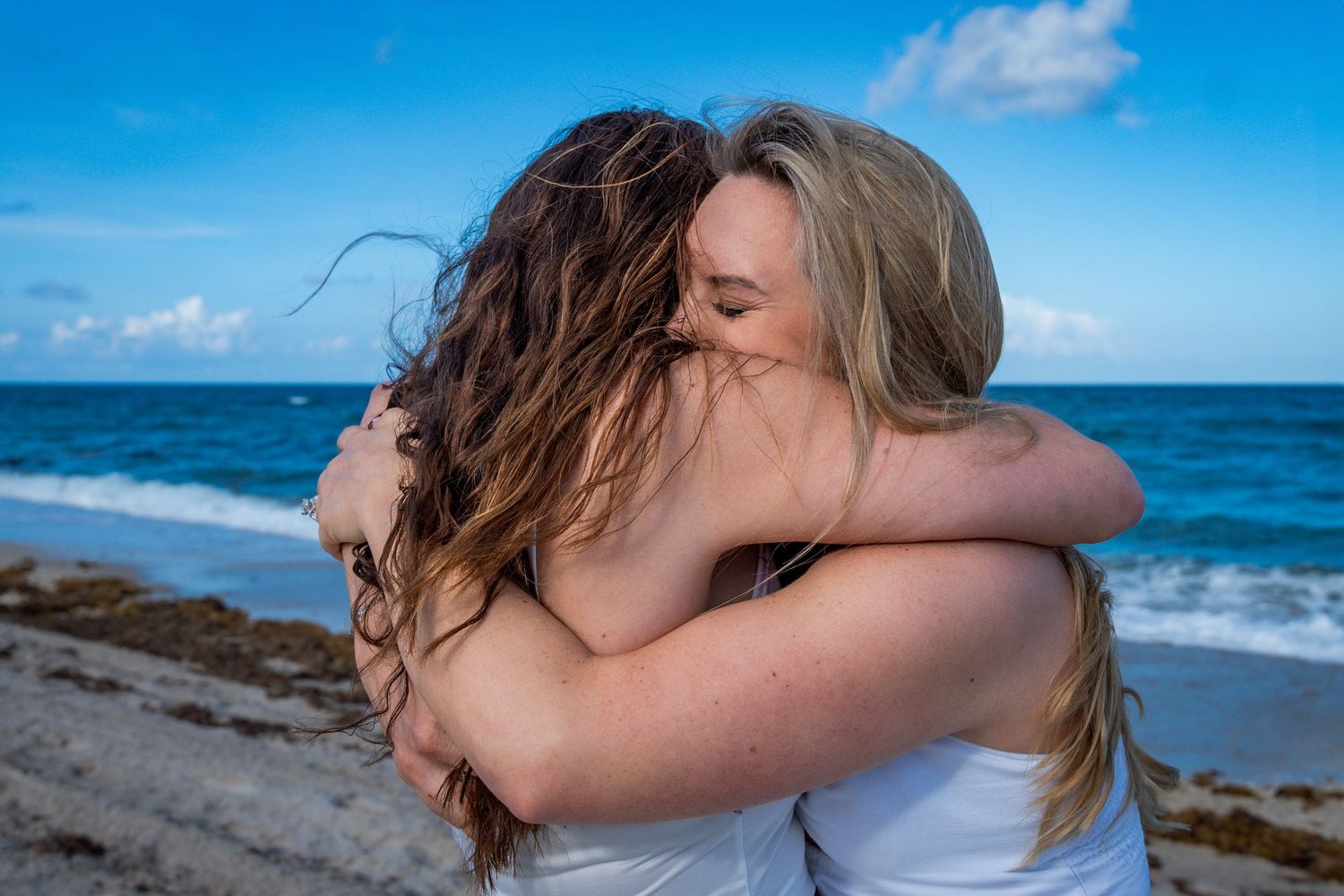 Heartfelt moment as bride-to-be shares her excitement after a surprise beachfront proposal.