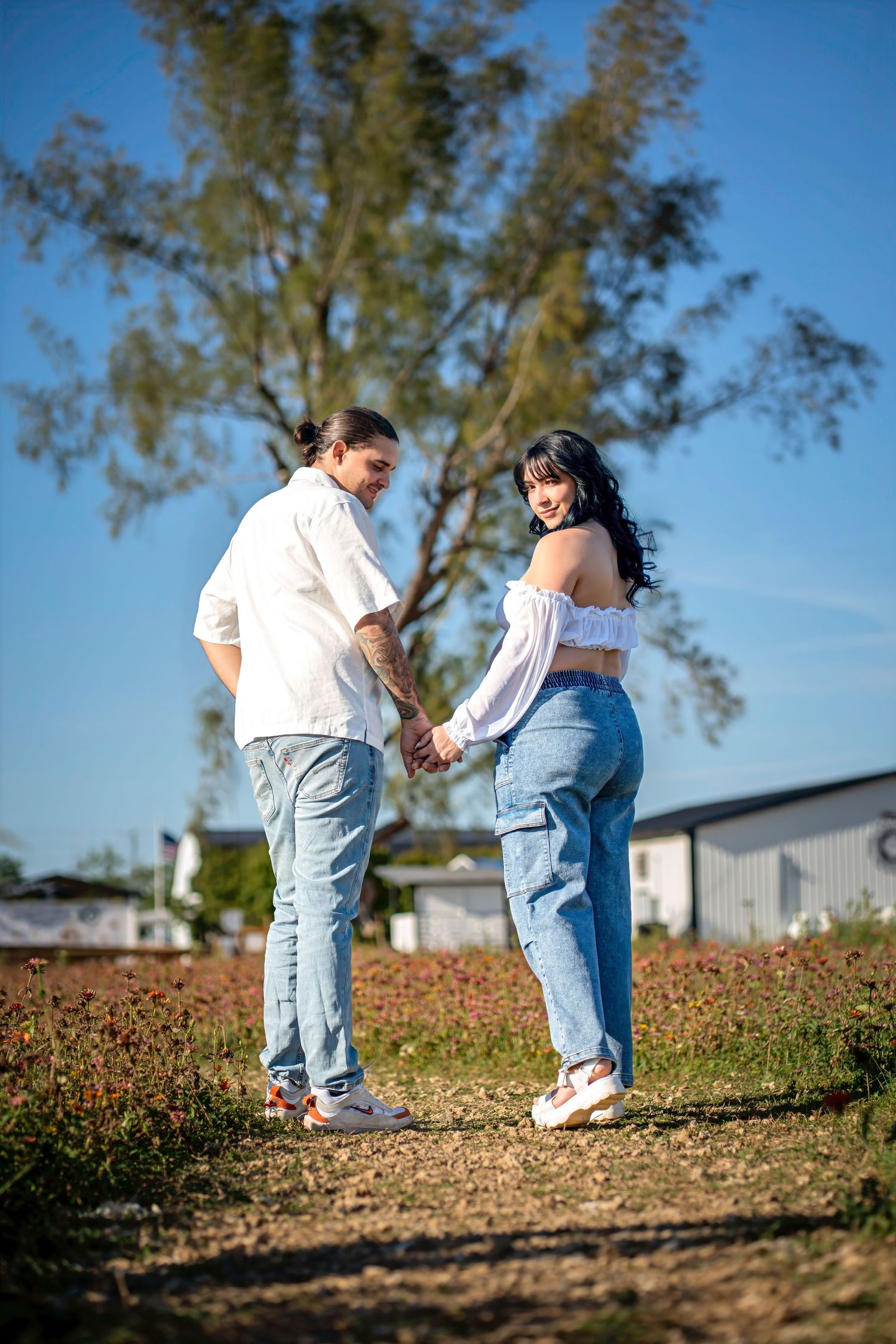 Walking maternity moment at Berry Farms, captured in Miami.