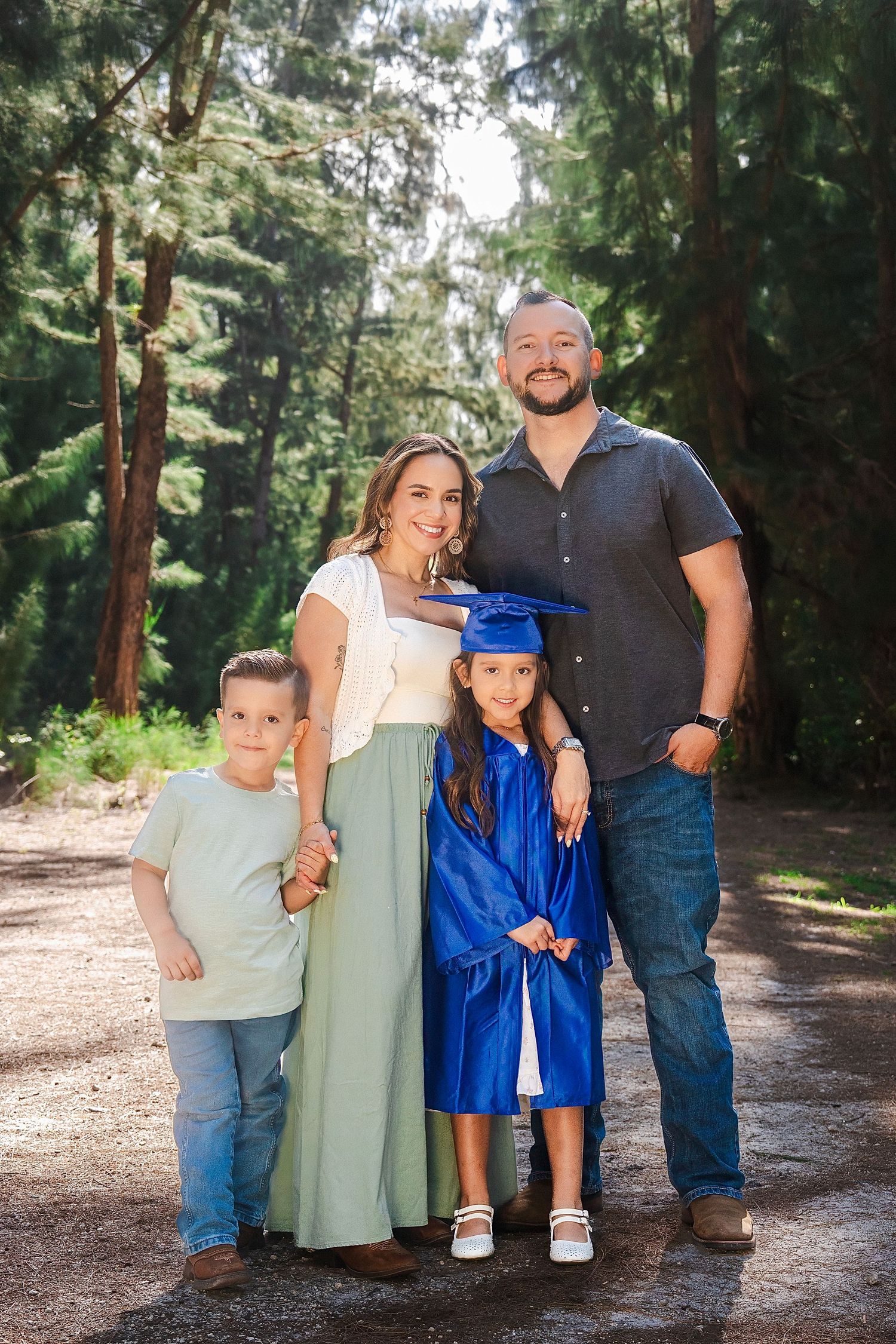 Family kindergarten graduation photos at Tree Tops Park in Davie by South Florida photographer, outdoor portrait session