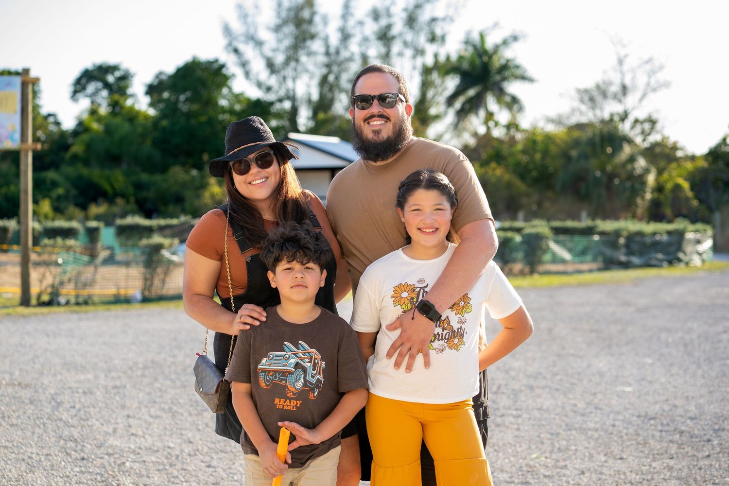 Candid family moment from South Florida birthday party at Berry Farms.