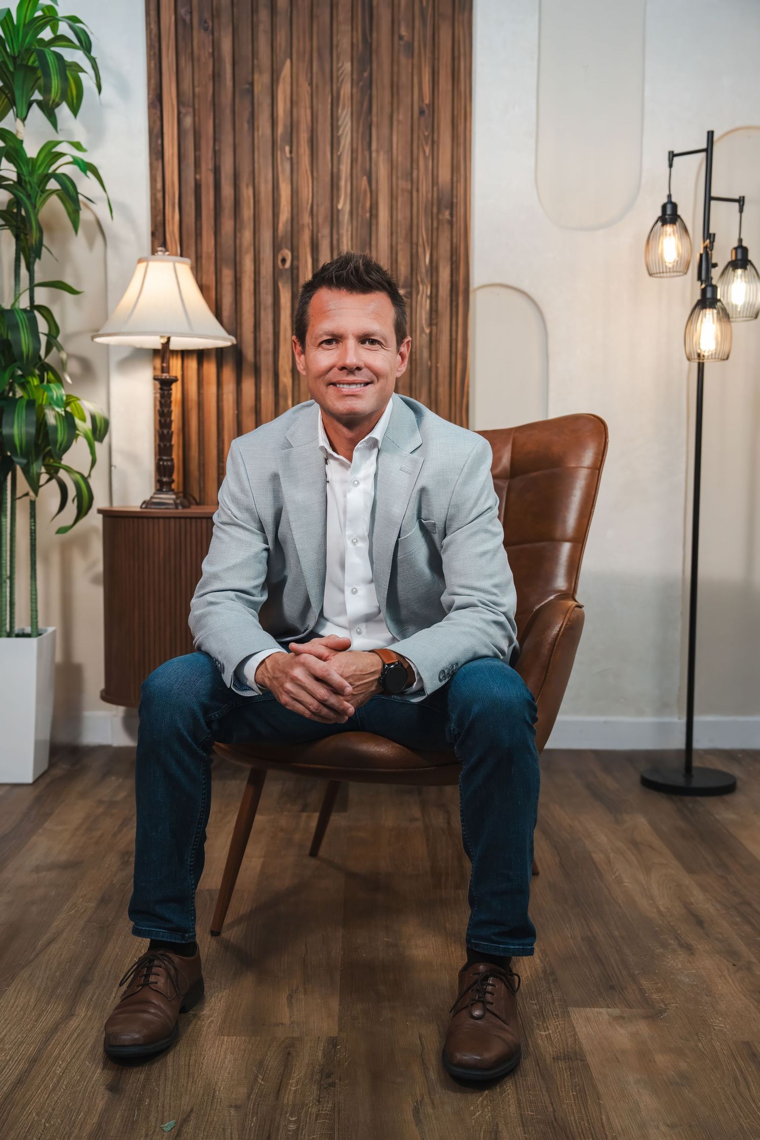 Realtor seated in modern office during professional branding session in Miami