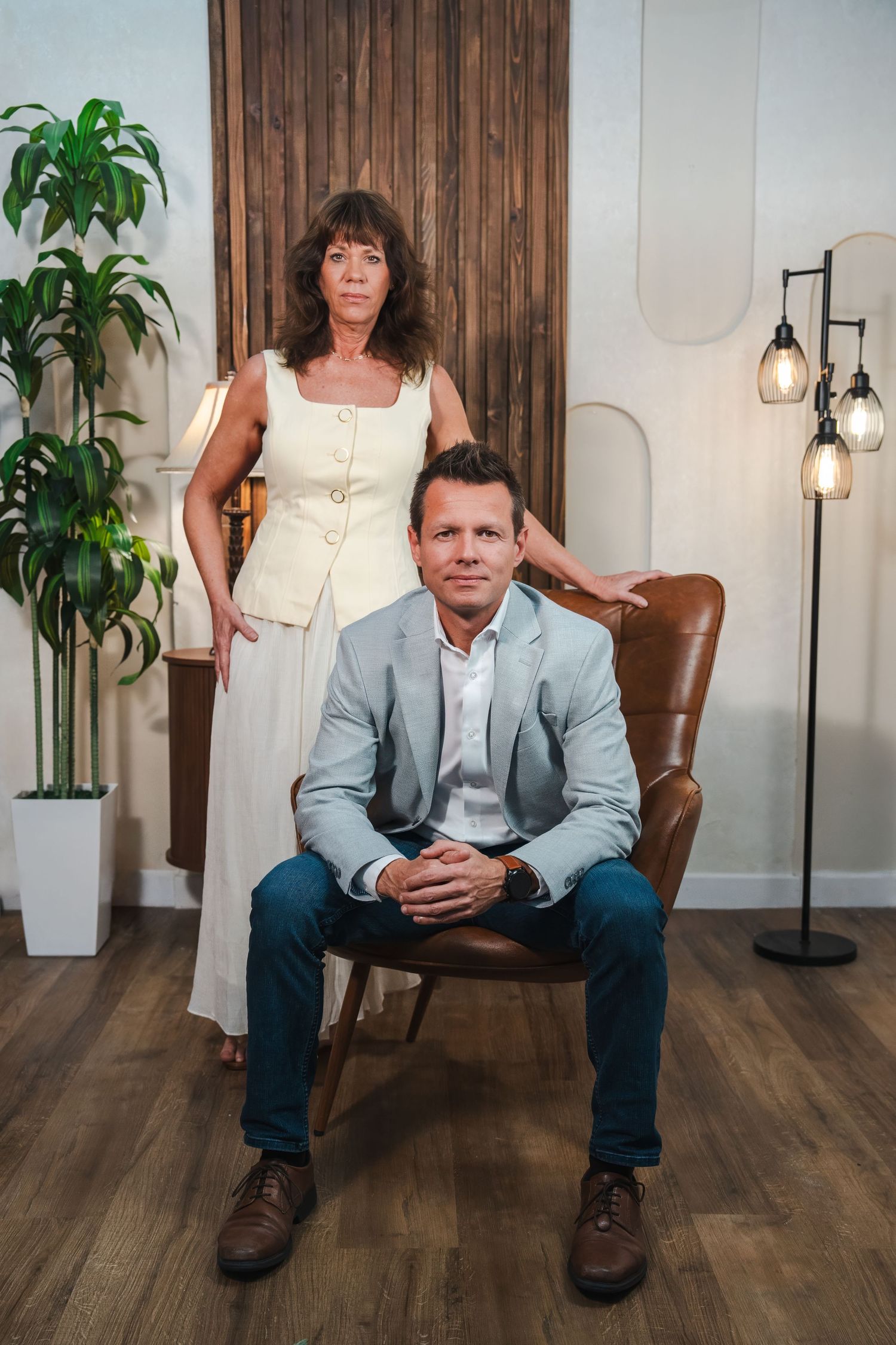 Realtor team posing in styled office during professional branding session