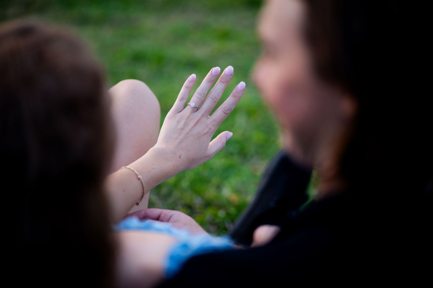 Close-up of woman showing engagement ring during Fort Lauderdale session