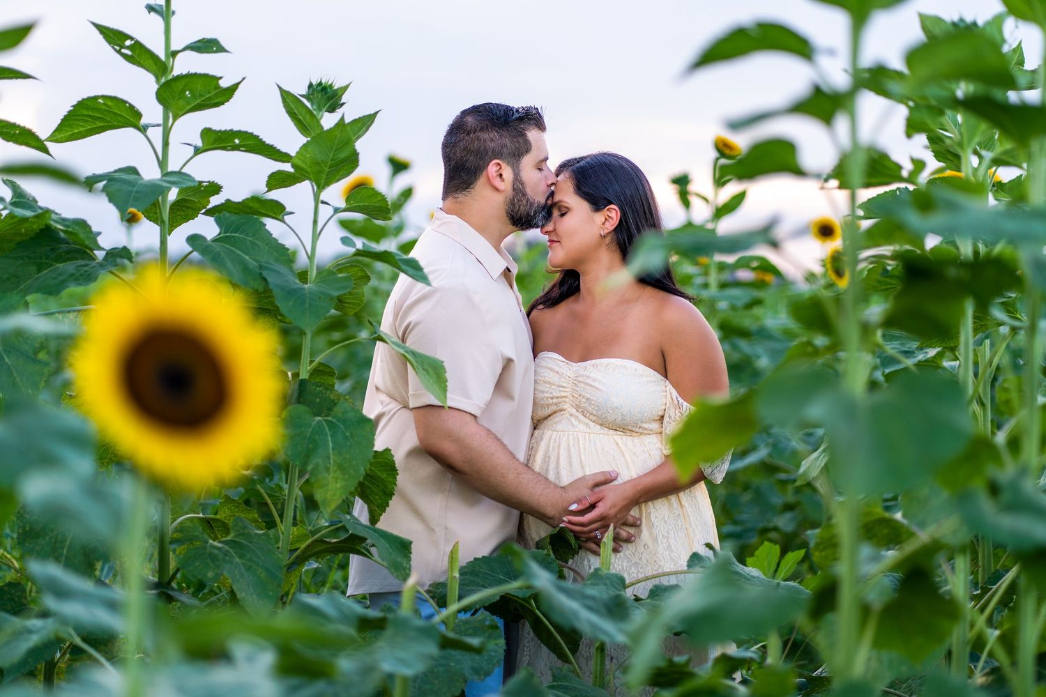 Couples photos in sunflower field by South Florida photographer, romantic outdoor session with natural light and editorial feel