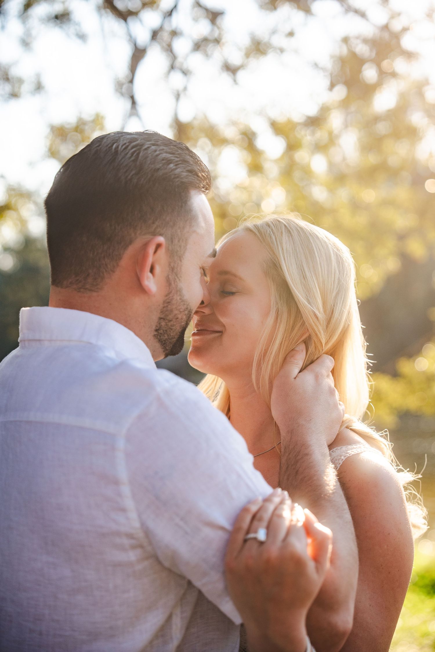 Engagement photos at Tree Tops Park in Davie by South Florida photographer, couple in golden hour light with romantic feel