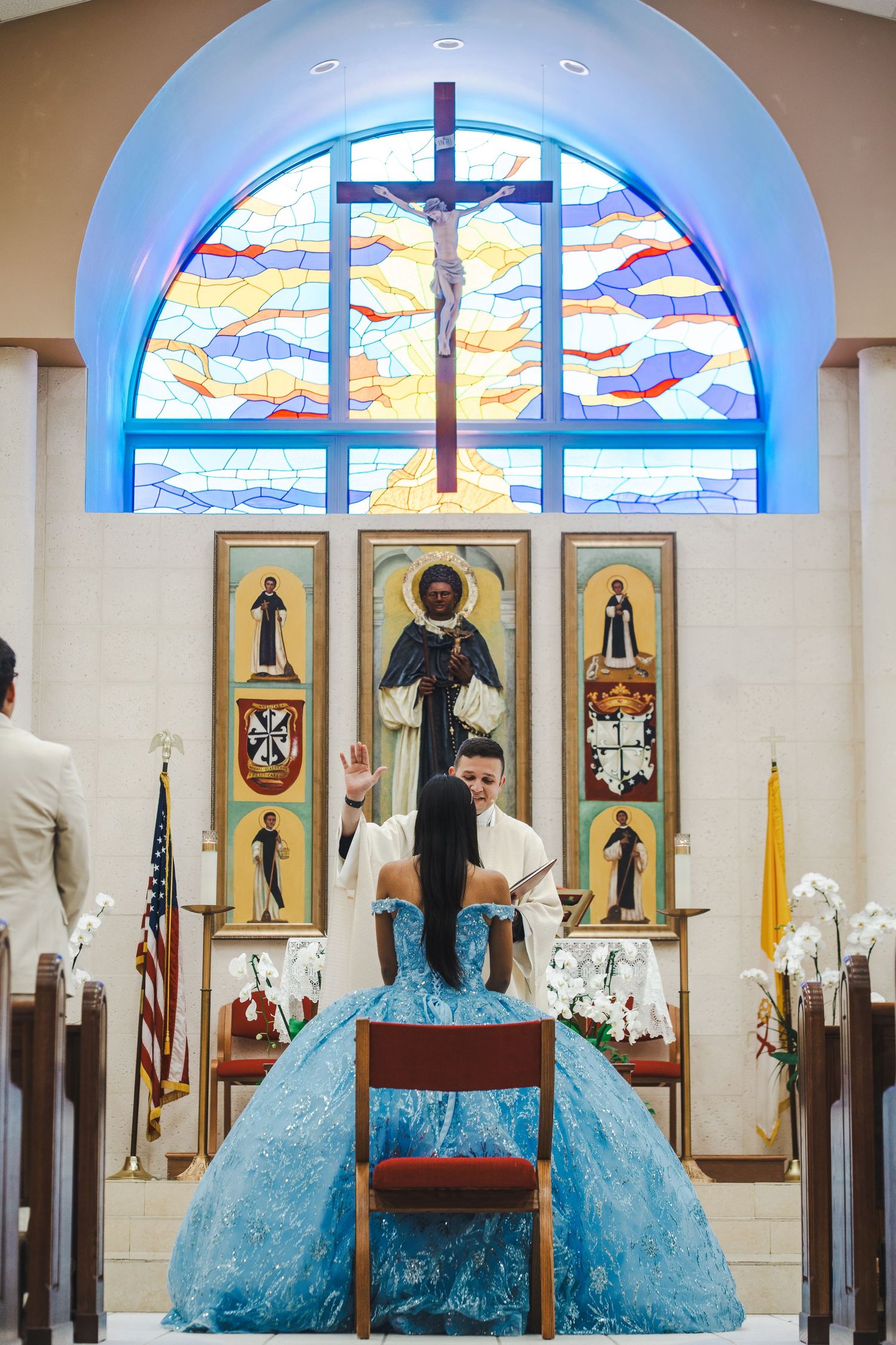 Elegant quinceañera portrait in church setting created through a guided photography experience with soft, editorial posing