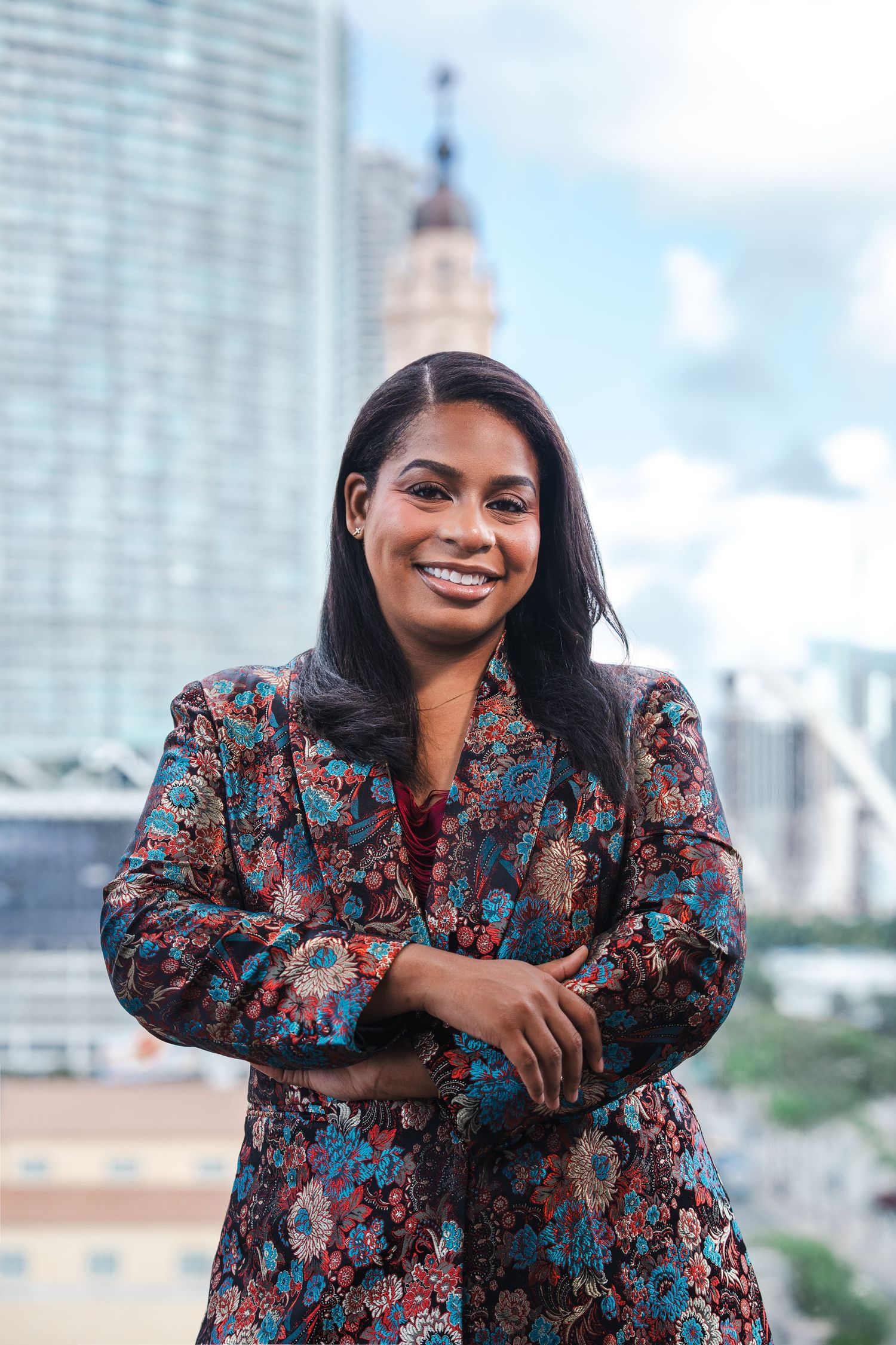 Entrepreneur smiling in downtown Miami during outdoor branding session