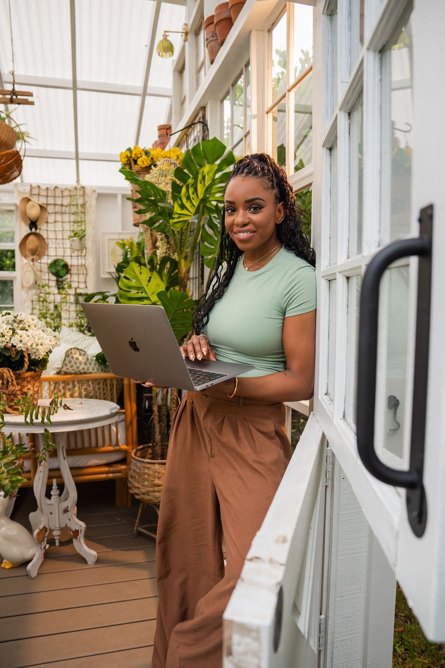 Fort Lauderdale professional branding photo of woman working on laptop in bright indoor space
Boca Photographer