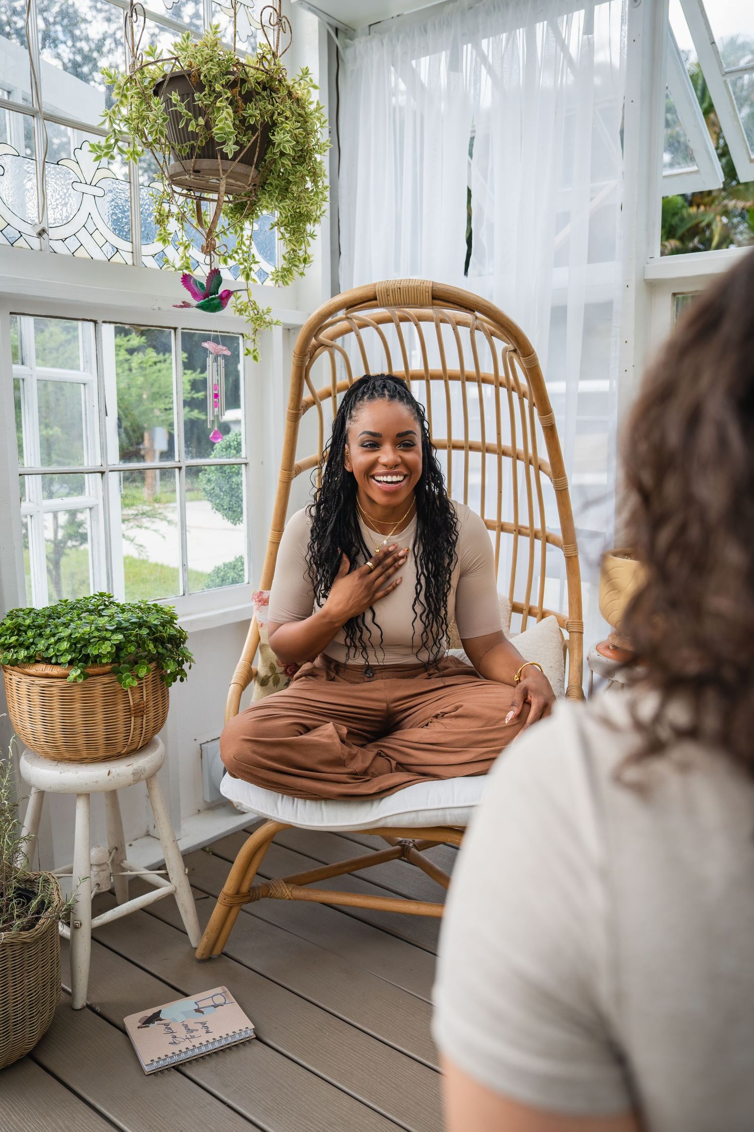 Lifestyle branding portrait of woman seated in wicker chair during Fort Lauderdale session Southwest Ranches Photographer