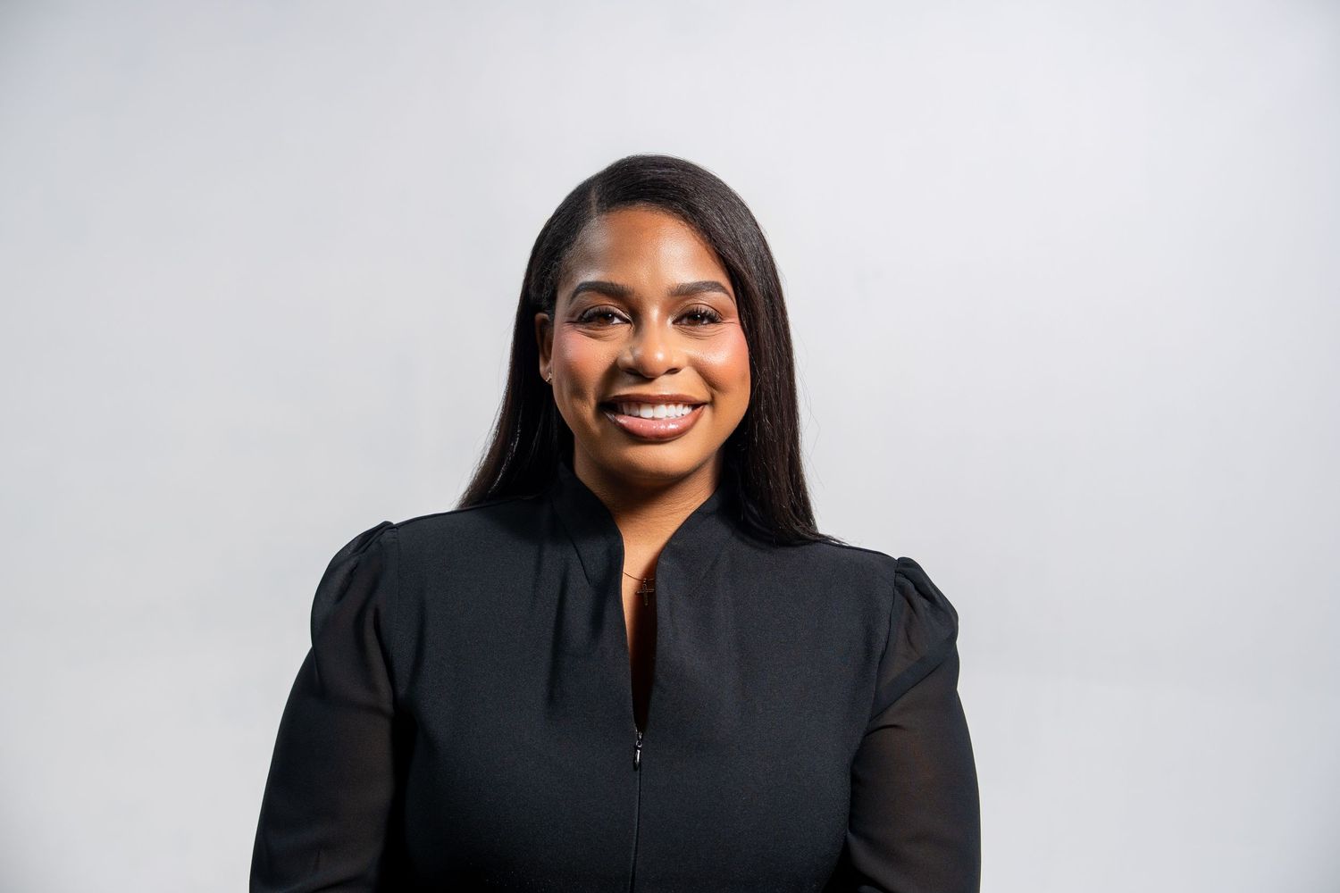 Clean studio branding portrait of a scholarship coach for professional personal branding in South Florida.