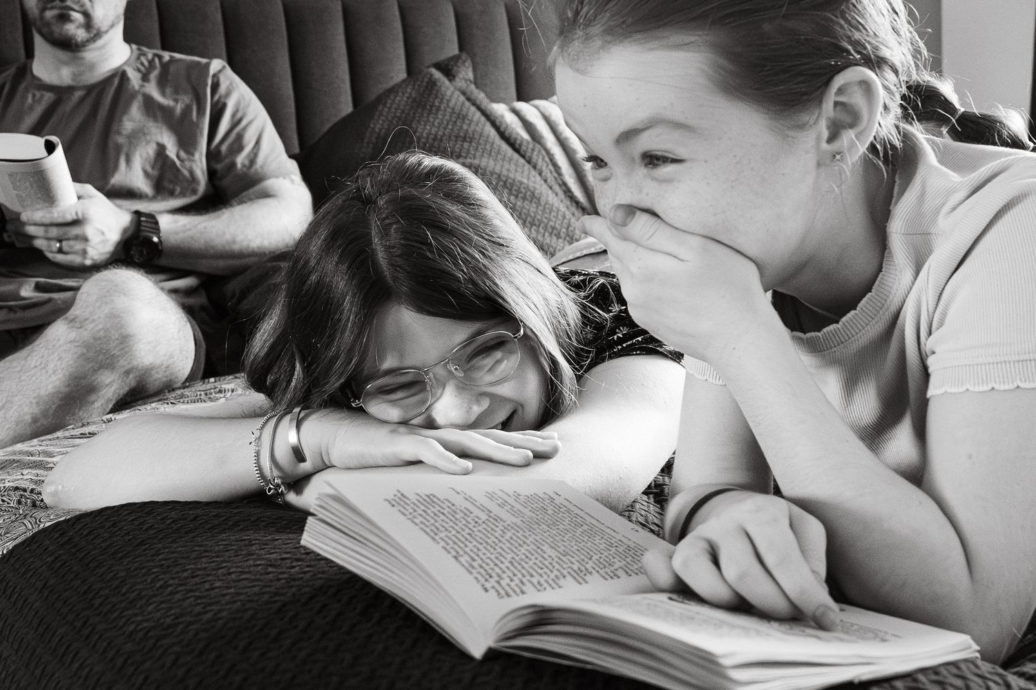 At-home family photograph showing laughter and connection. Documents real family-life.
