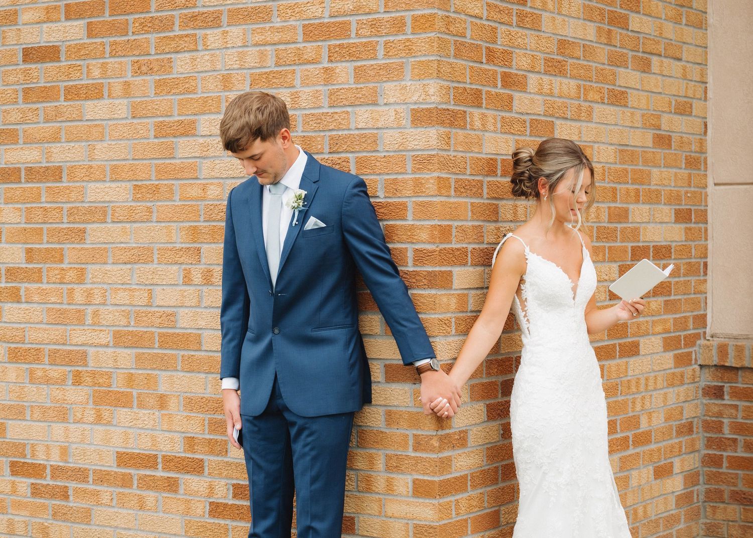 Wedding couple shares a playful moment against a brick wall in a candid sequence of photos.