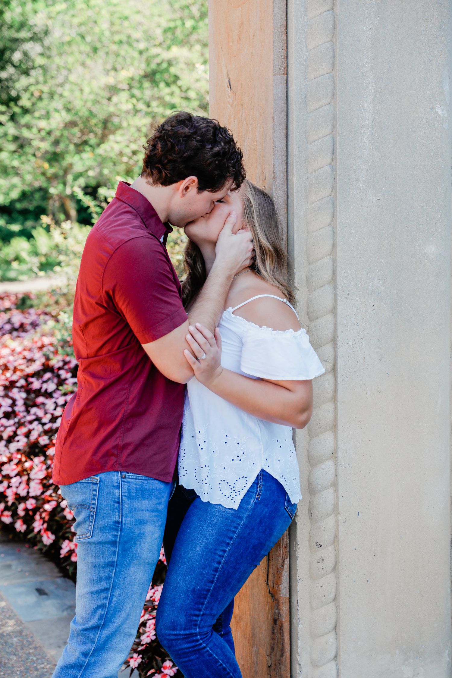 Bride and Groom kissing at the gardens for their Texas engagement session in Dallas.