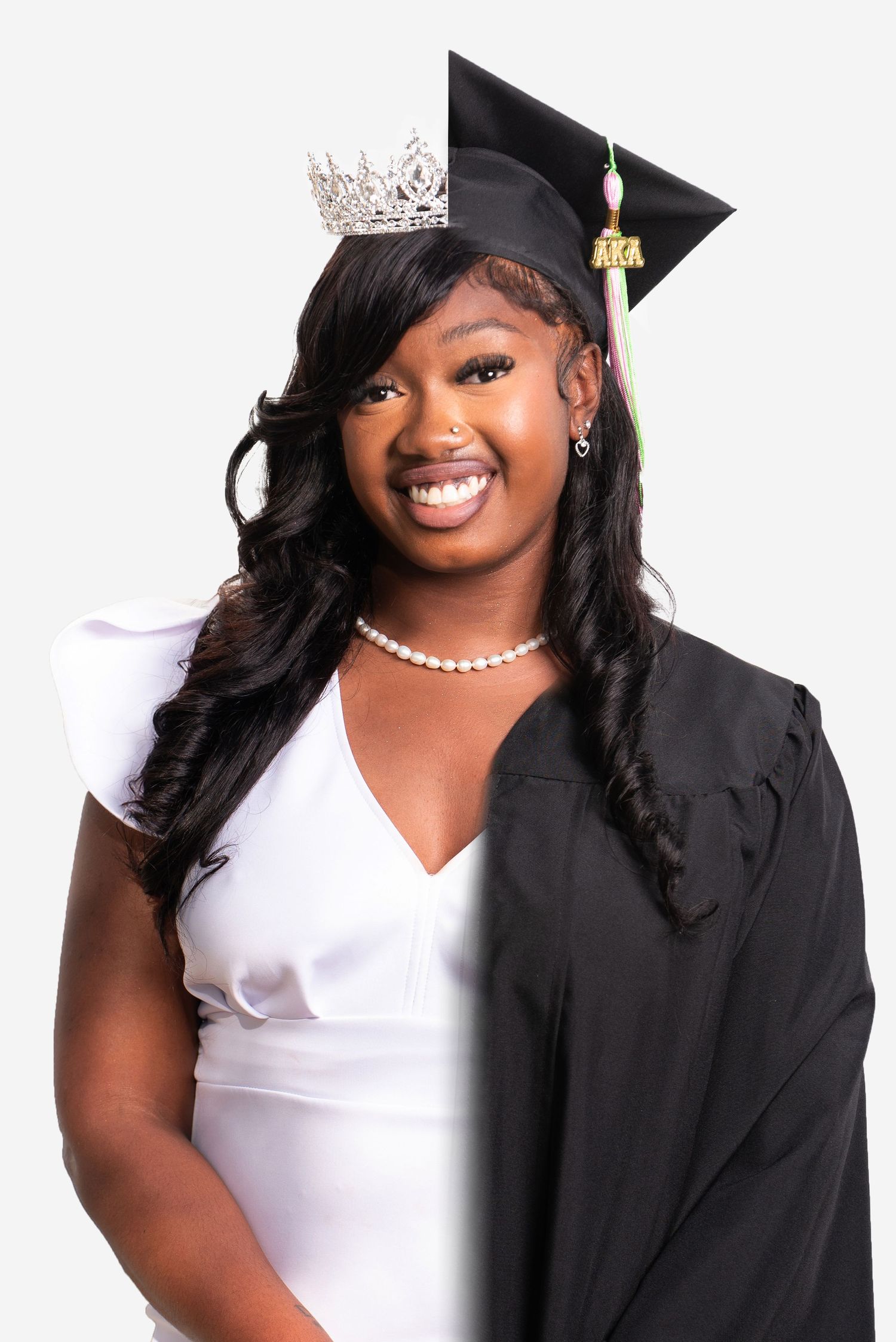 Graduate portrait with academic regalia and crown against white background.
