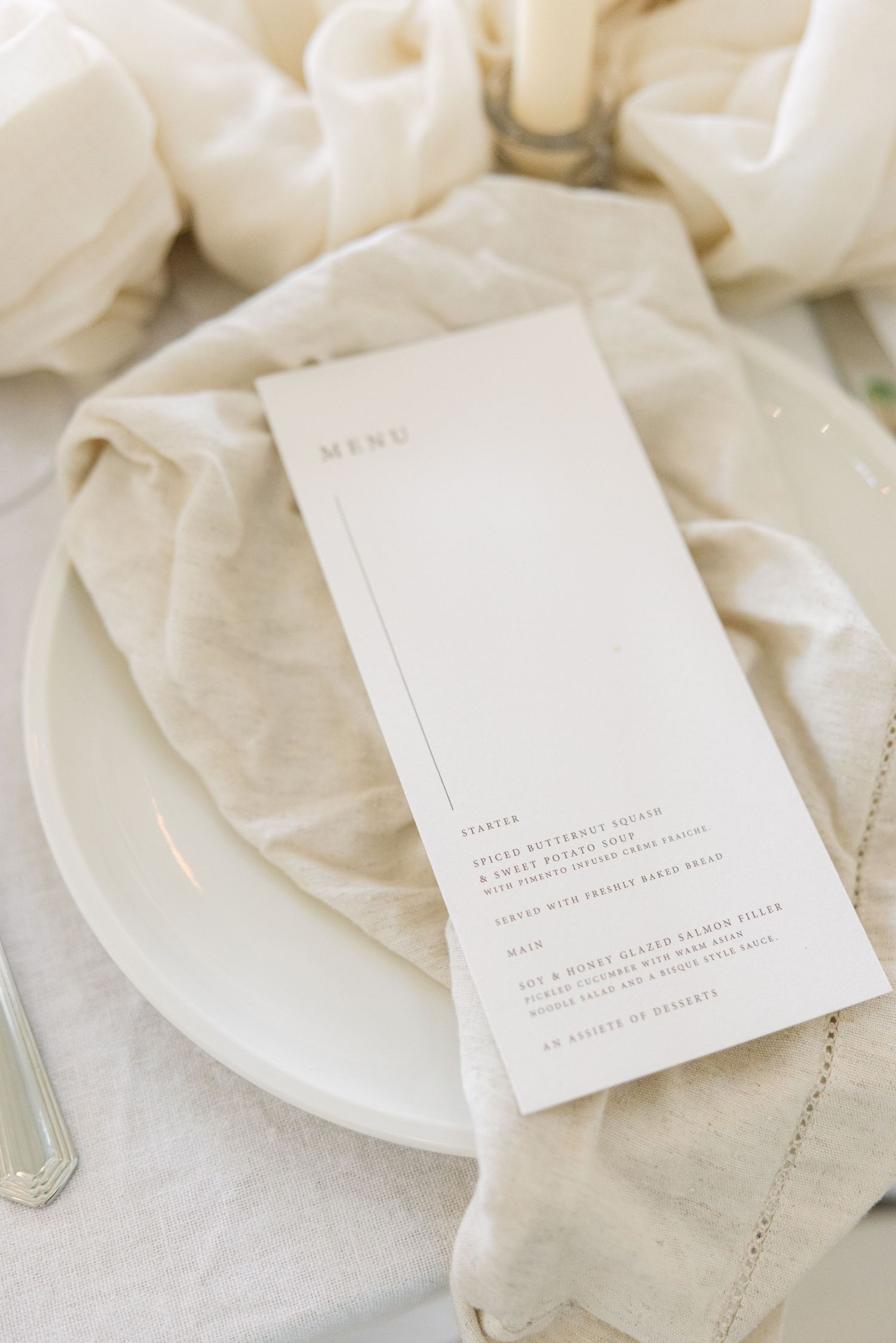 creamy and modern table set up at a luxurious wedding