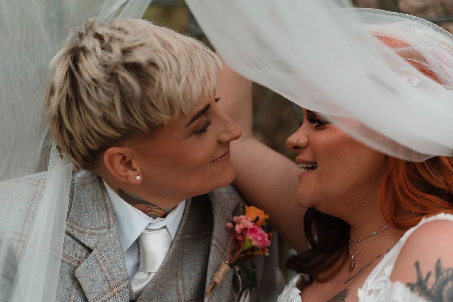 Close-up wedding photos capturing tender moments between newlyweds.