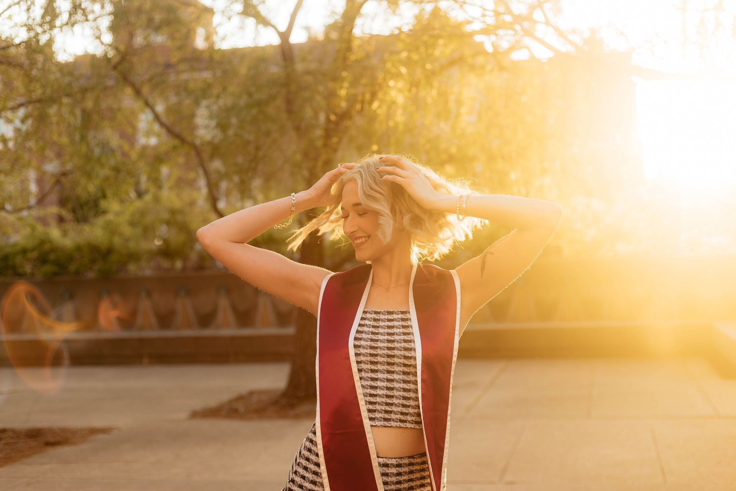 Golden sunset photos capturing joyful moments with a guitar outdoors.