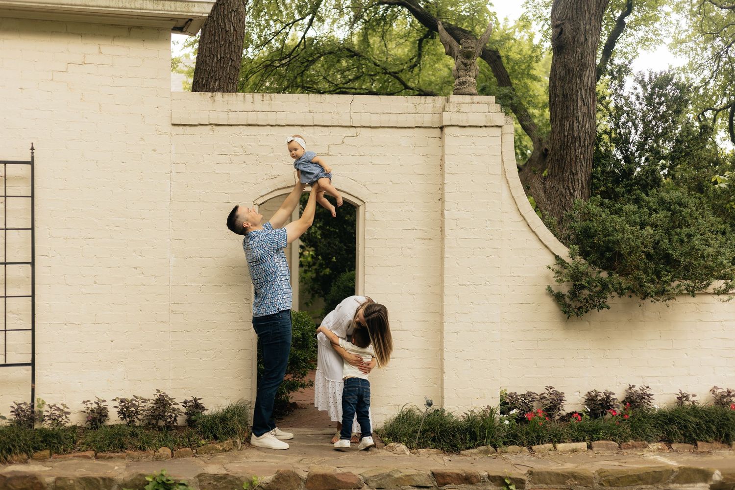 A creative photo sequence showing someone climbing a white brick wall.