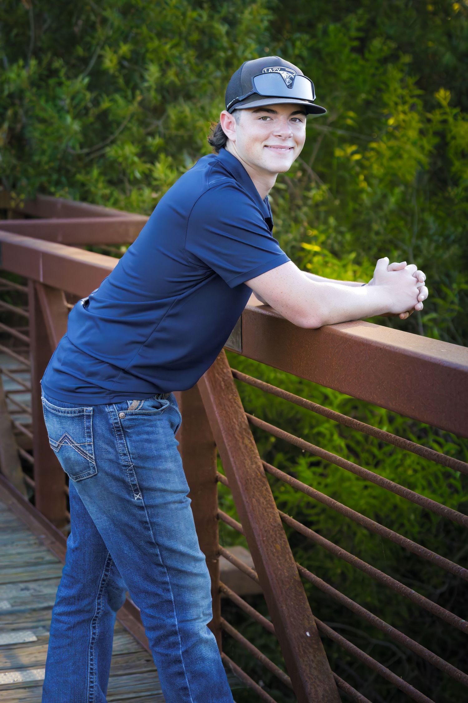 Male-Senior portrait photographed outdoors at Consumes River Preserve, Sacramento, California by Tea & Sugar Shots by Gretchen Schmidt.