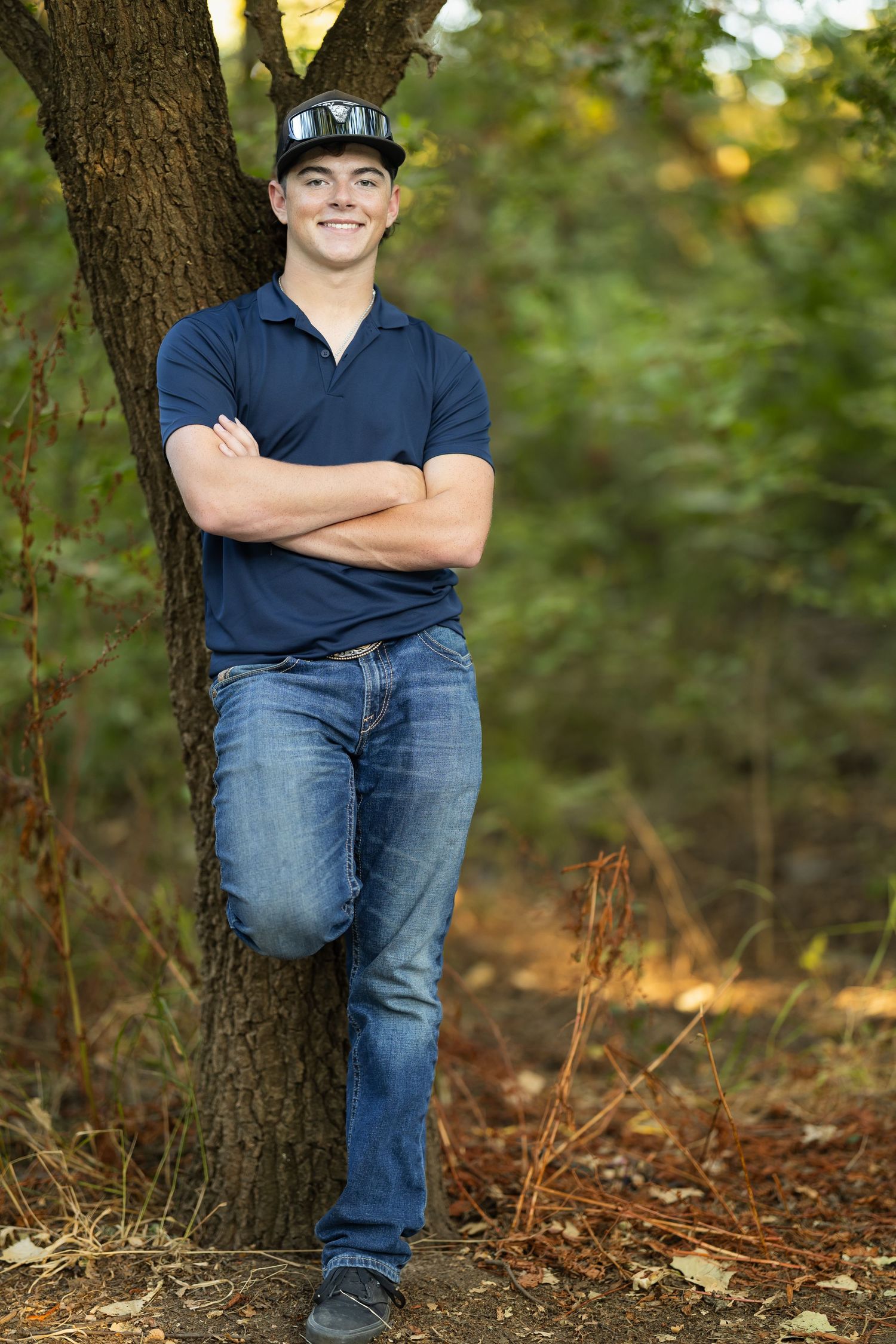 Male-Senior portrait photographed outdoors at Consumes River Preserve, Sacramento, California by Tea & Sugar Shots by Gretchen Schmidt.