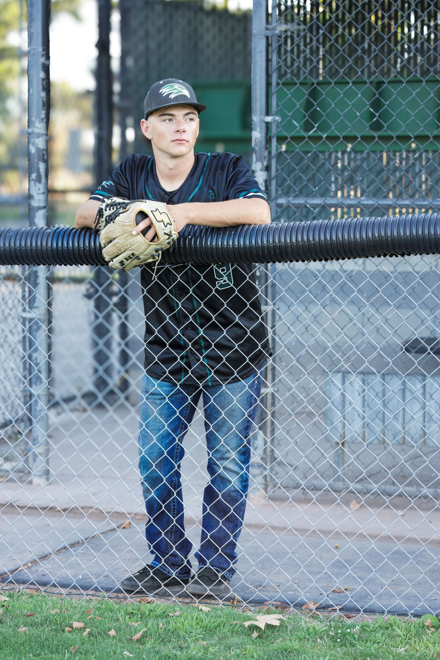 Male-Baseball Senior portrait photographed outdoors in Galt, California by Tea & Sugar Shots by Gretchen Schmidt.