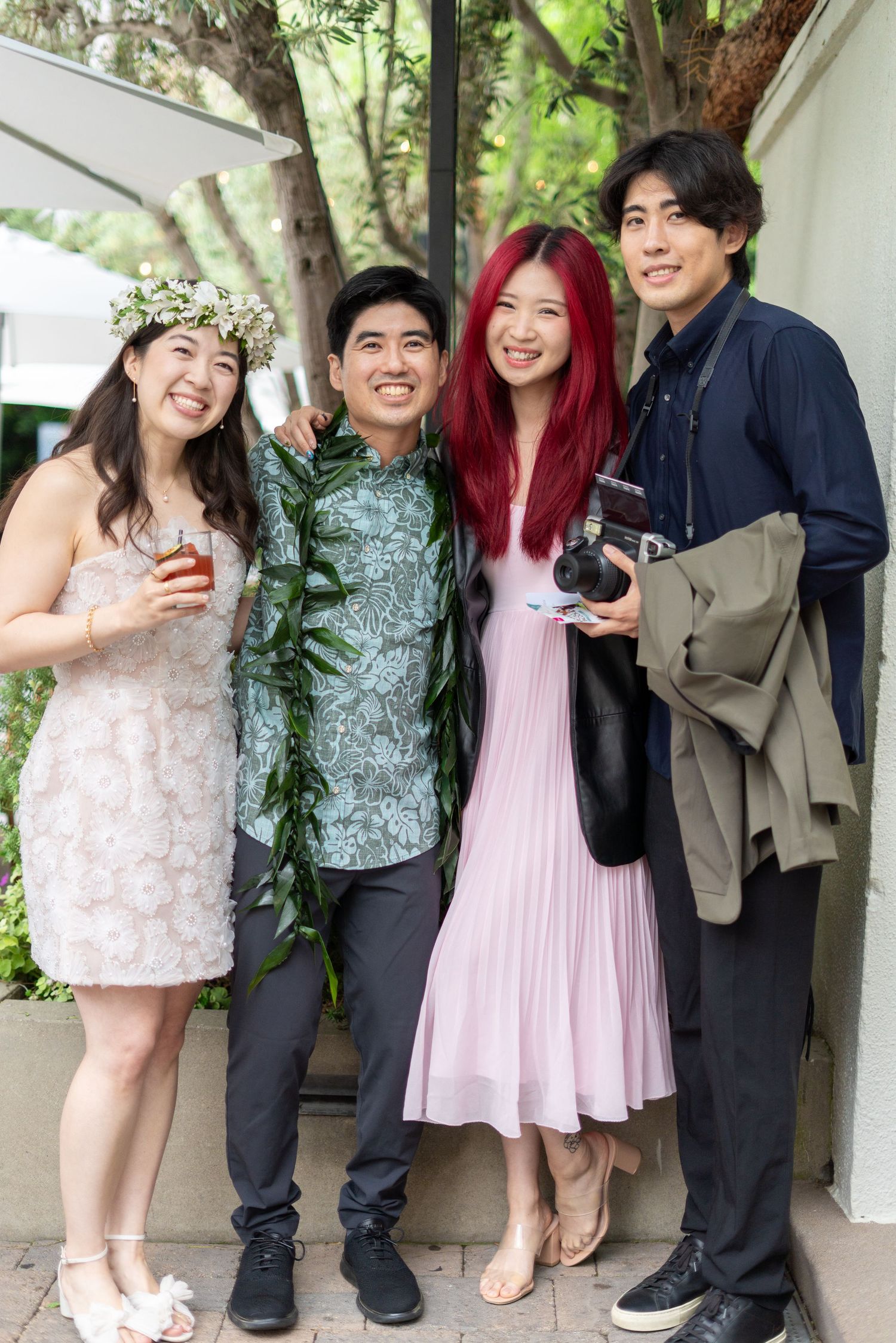 Friends posing with joy and love, capturing memories at the ceremony. #WeddingFriends #CherishedMoments #WeddingVibes