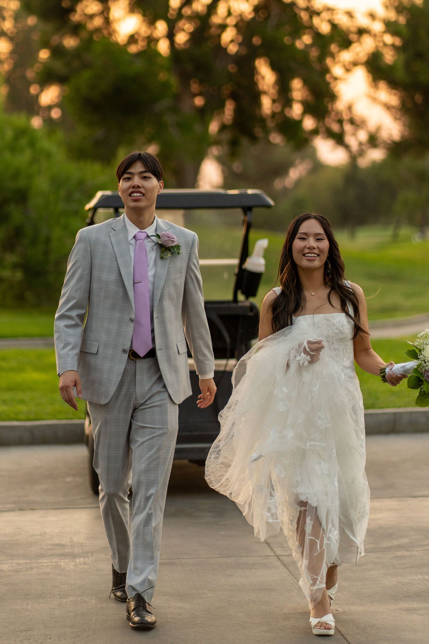 Bride and groom sharing a romantic couples photoshoot under a golden sunset.
